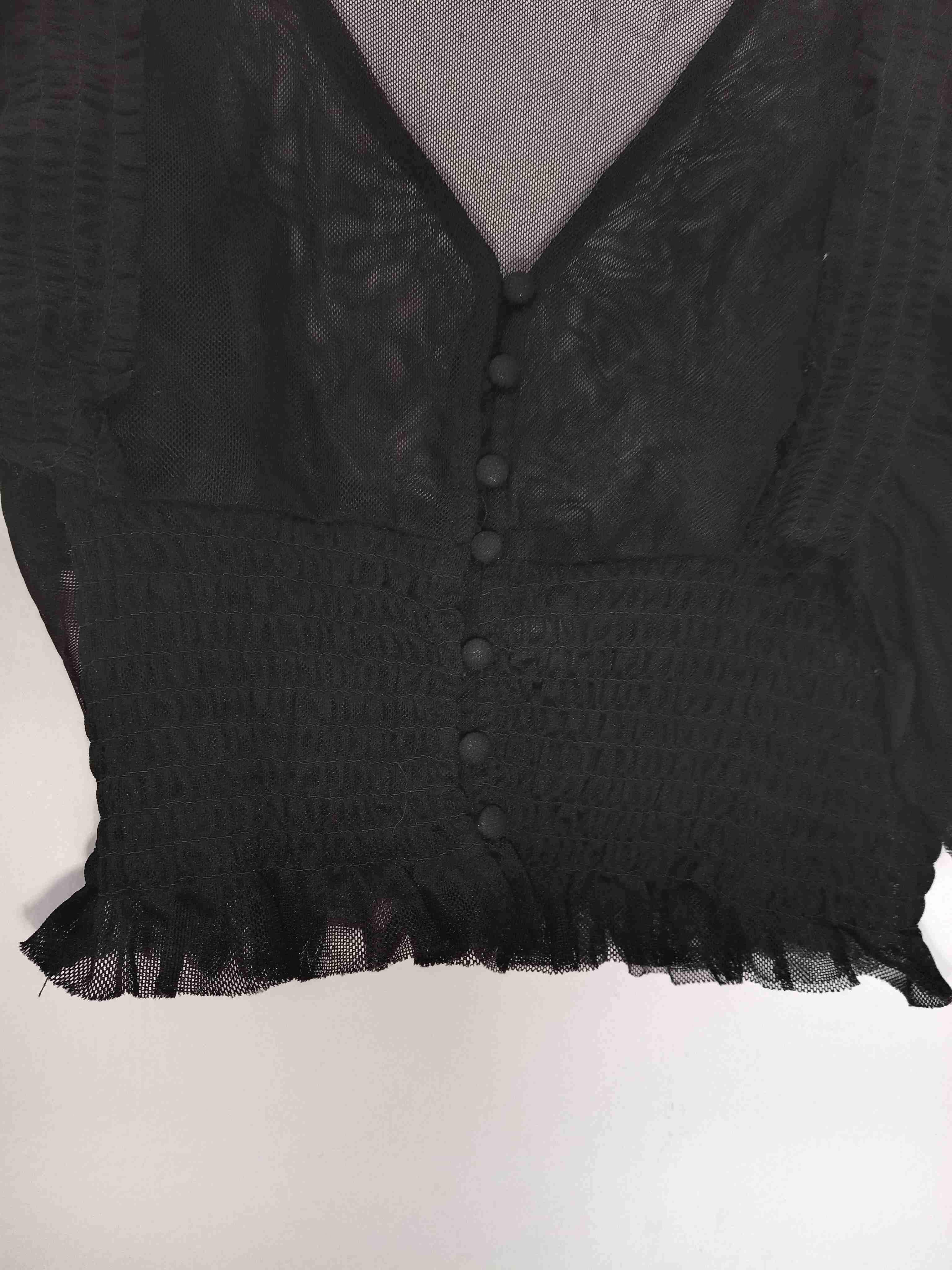 Blusa negra con abertura - miniatura 3