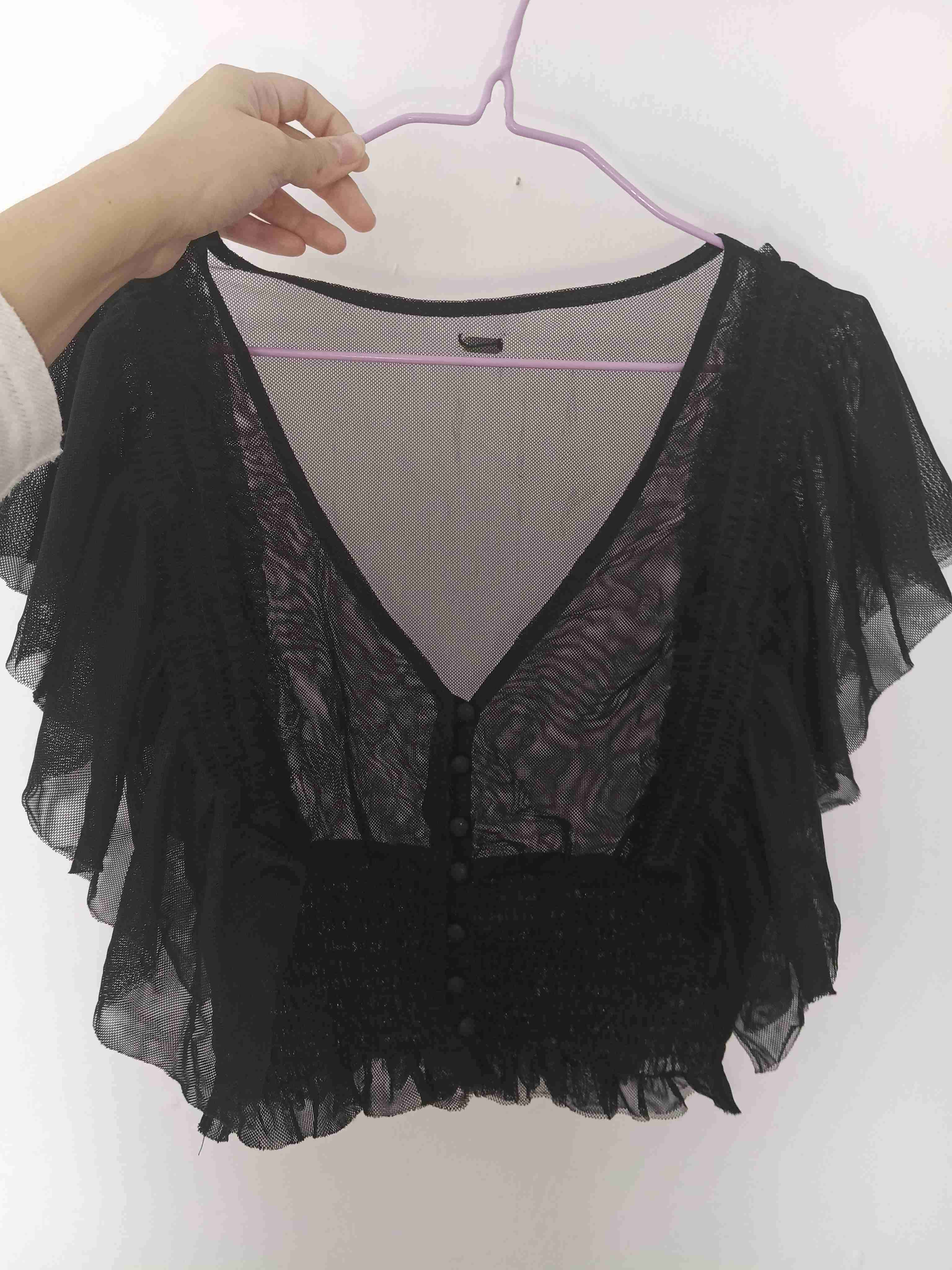 Blusa negra con abertura - miniatura 5