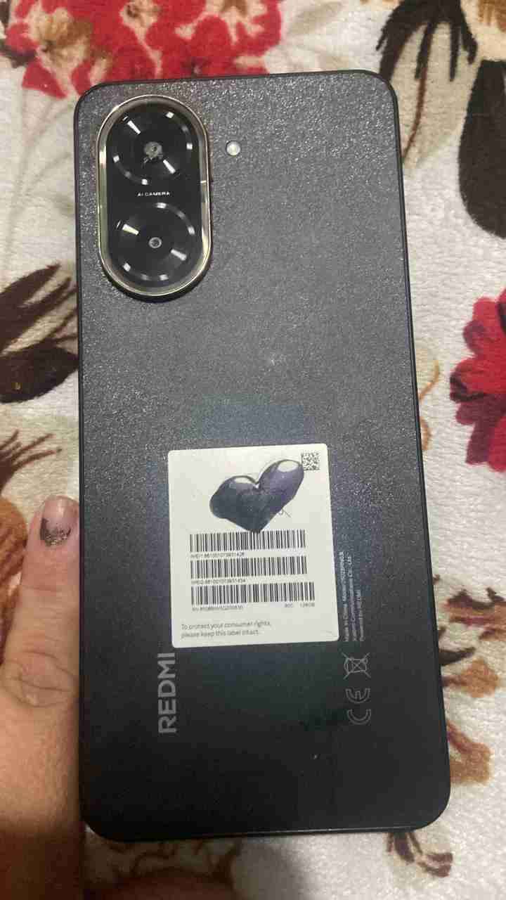 Teléfono Redmi negro en buen estado - miniatura 1