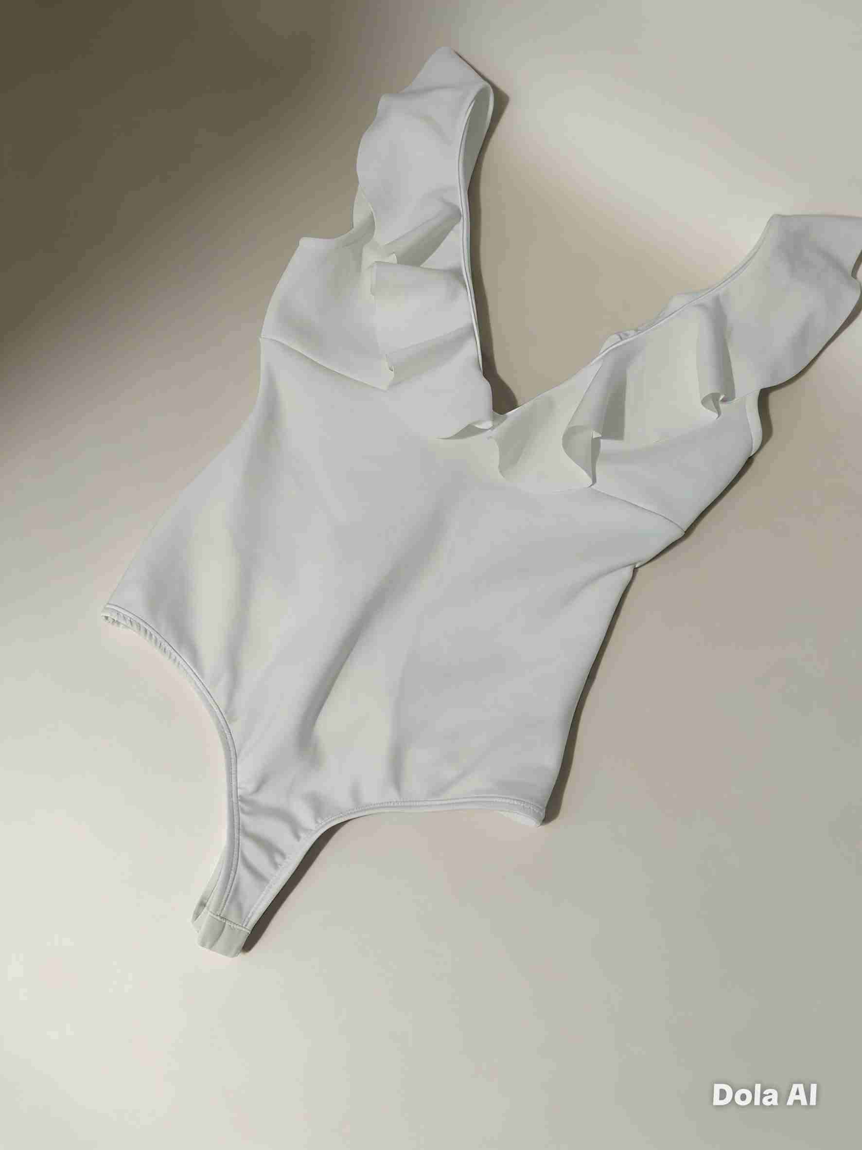 Body blanco con volantes