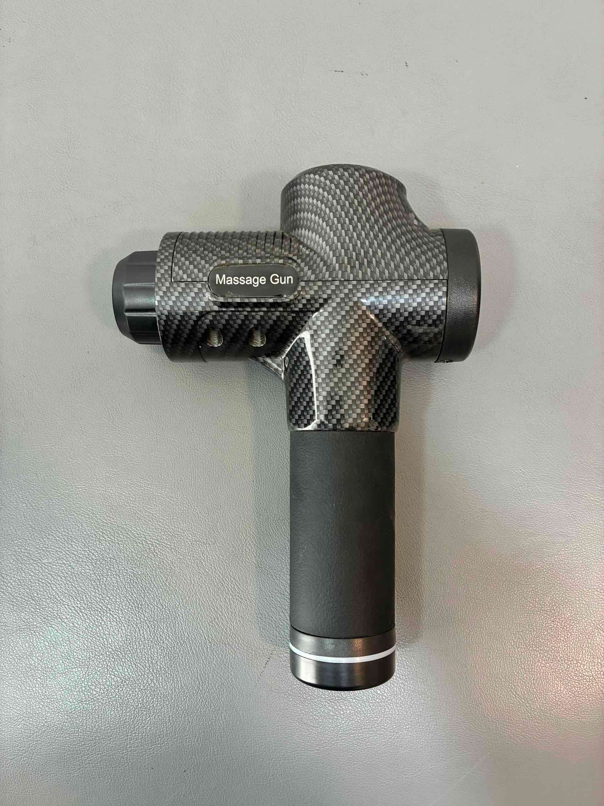 Pistola de masaje portátil - miniatura 1