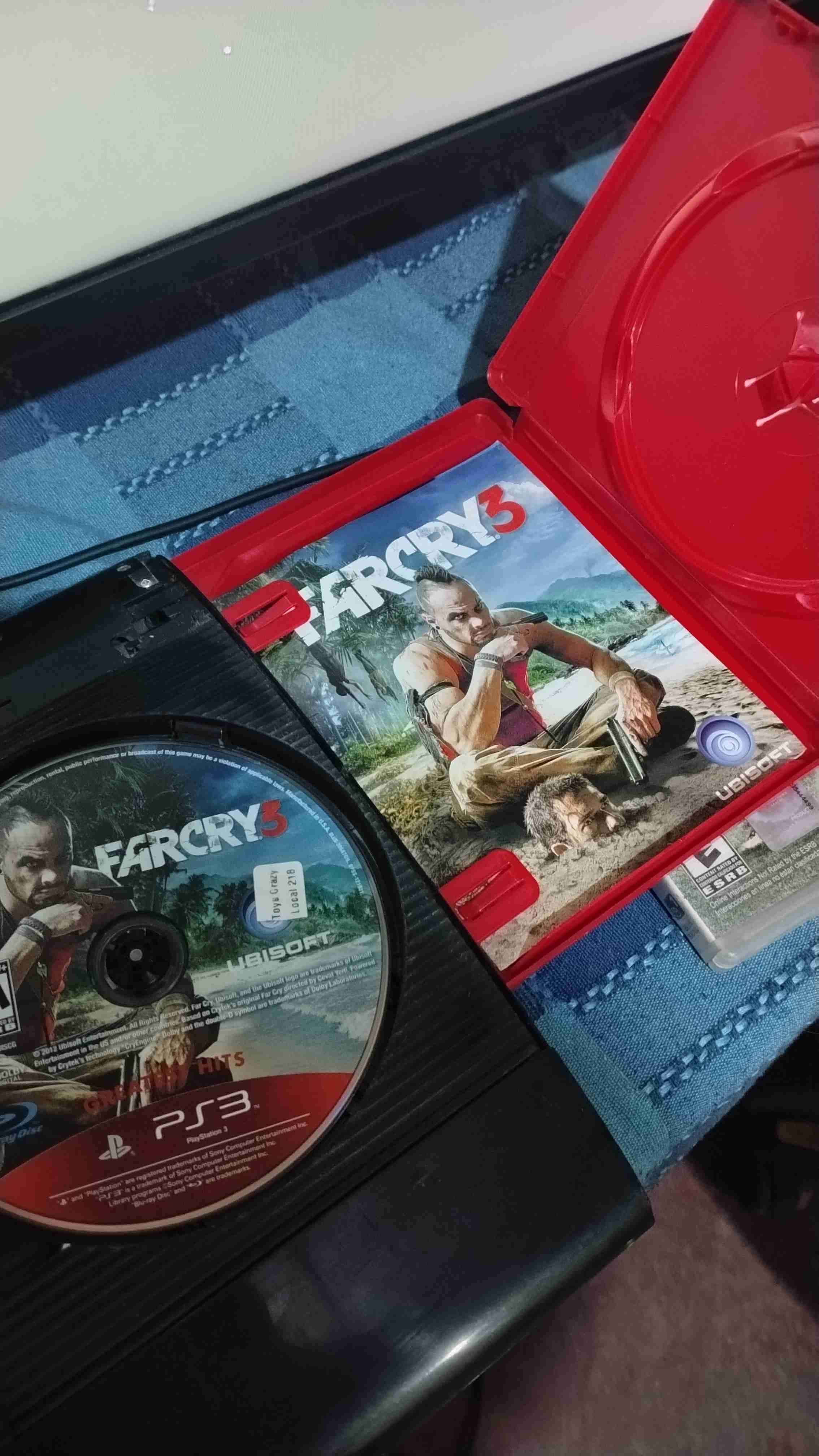 PlayStation 3 con mando y juegos - miniatura 4