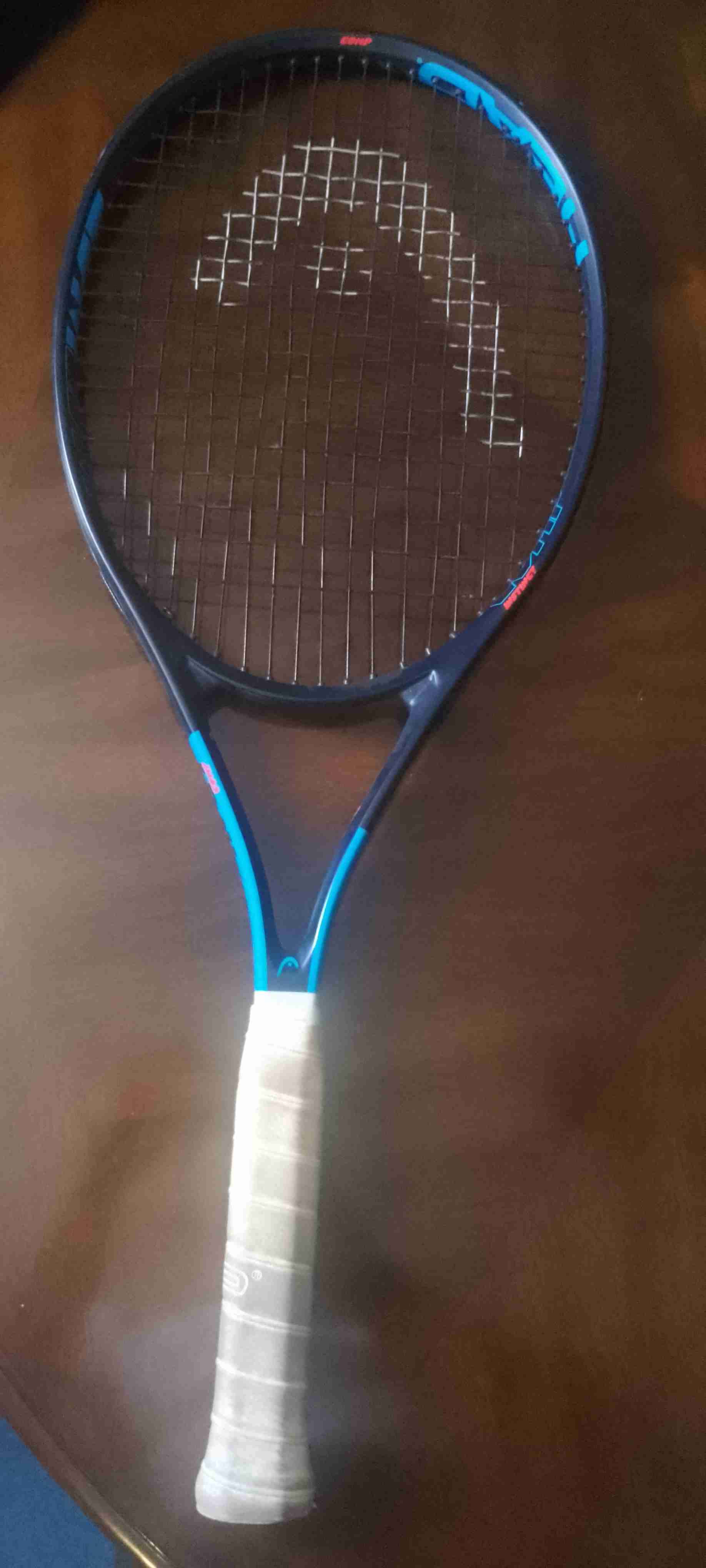 Raqueta de tenis azul y negra - 1