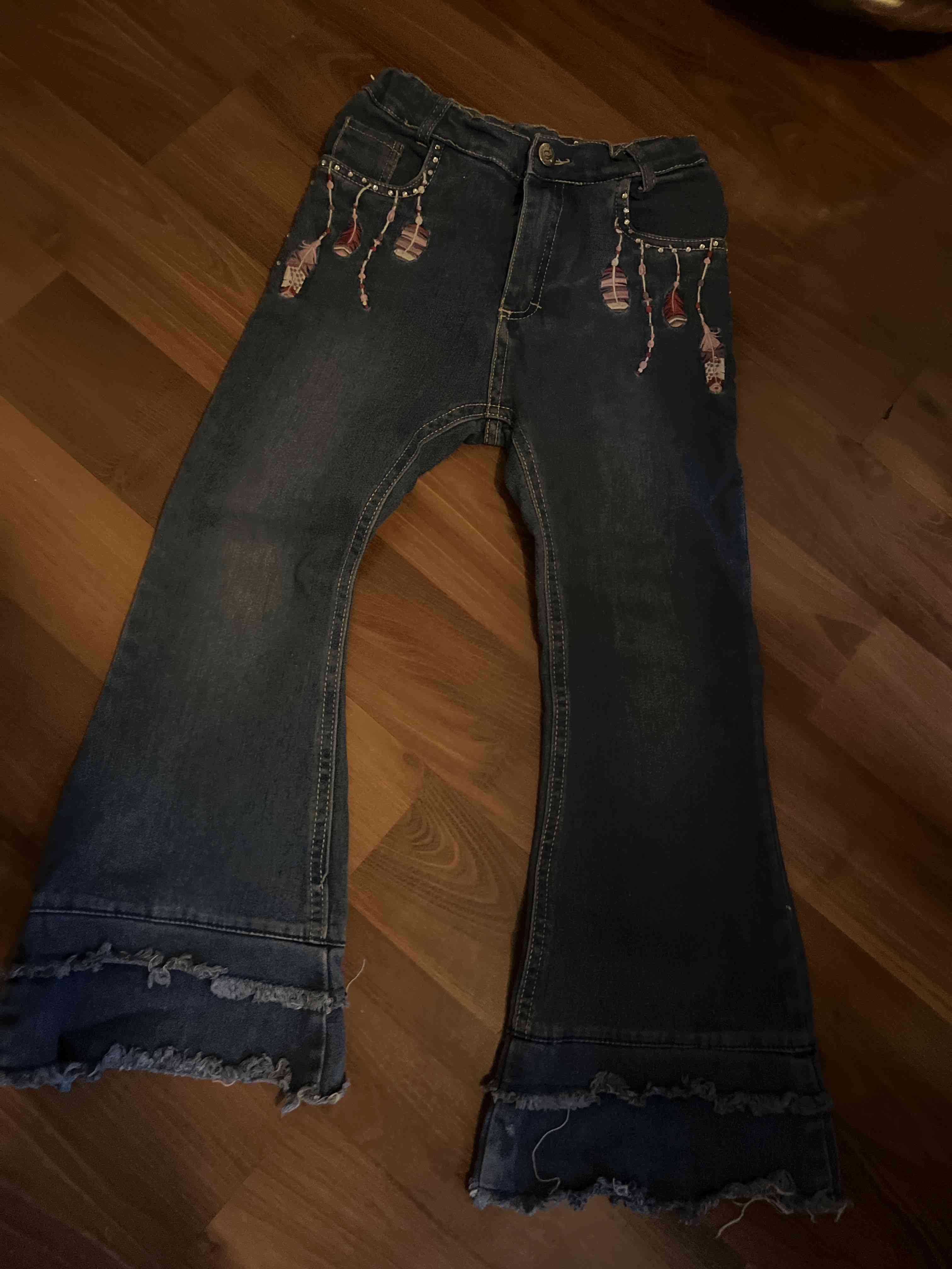 Jeans azules con adorno - miniatura 1