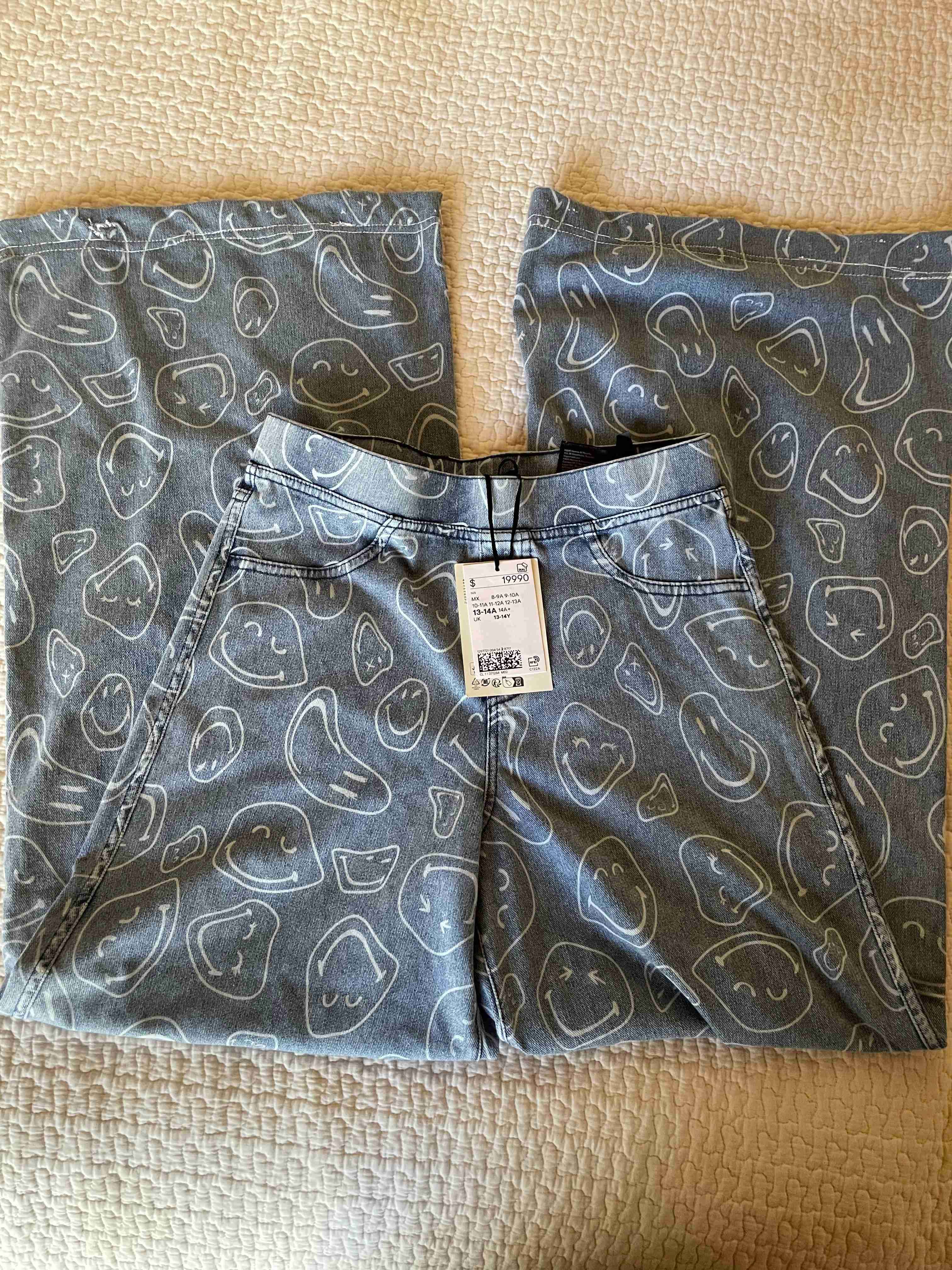 Jeans con diseño de caras - miniatura 1