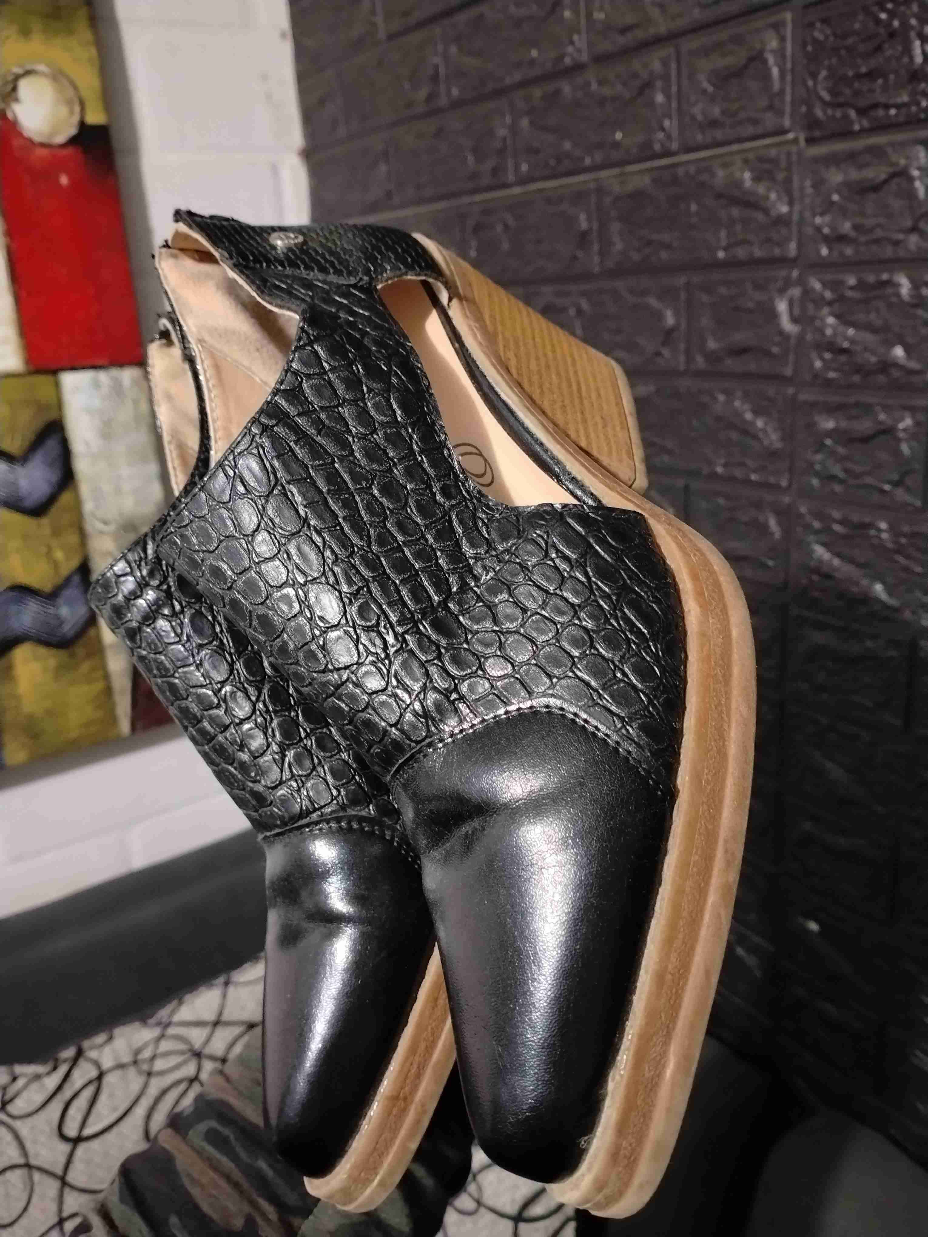 Botines negros de cuero texturizado - miniatura 1