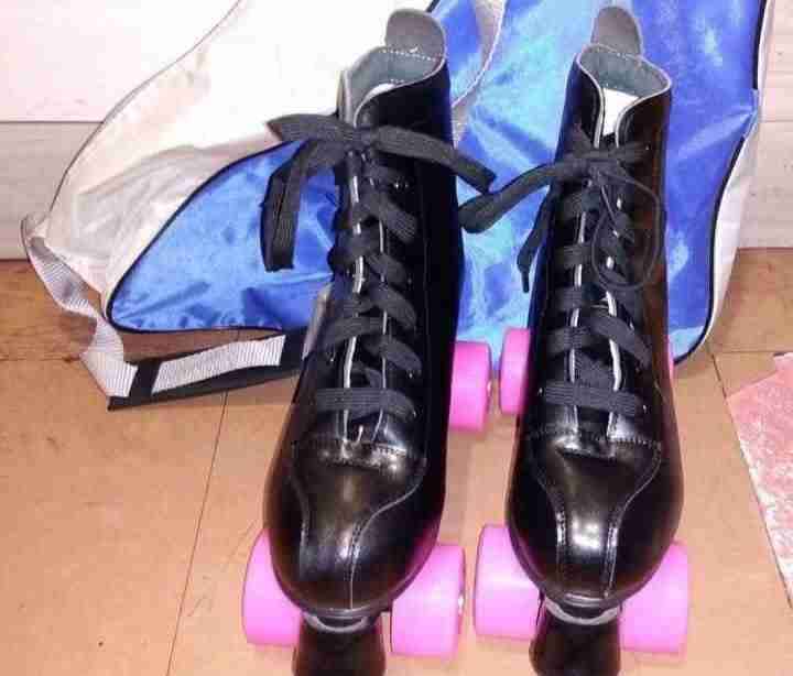 Patines profesionales de 4 ruedas negros - 1
