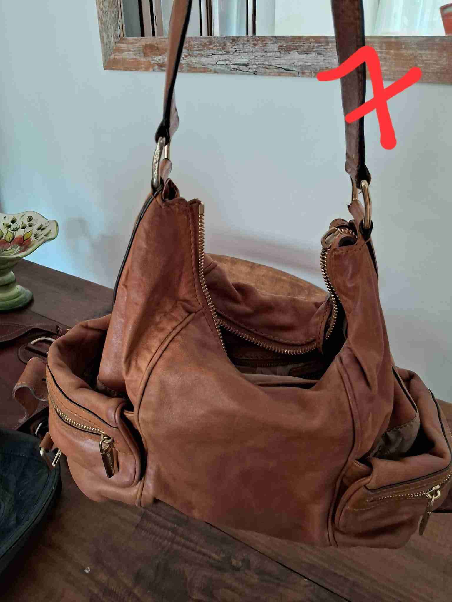 Bolso de cuero marrón mk