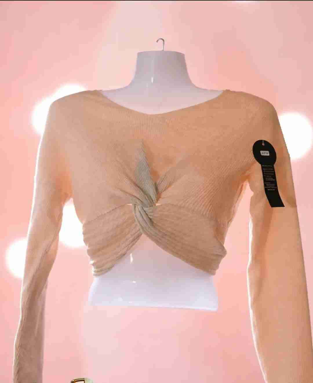 Top nude con nudo frontal