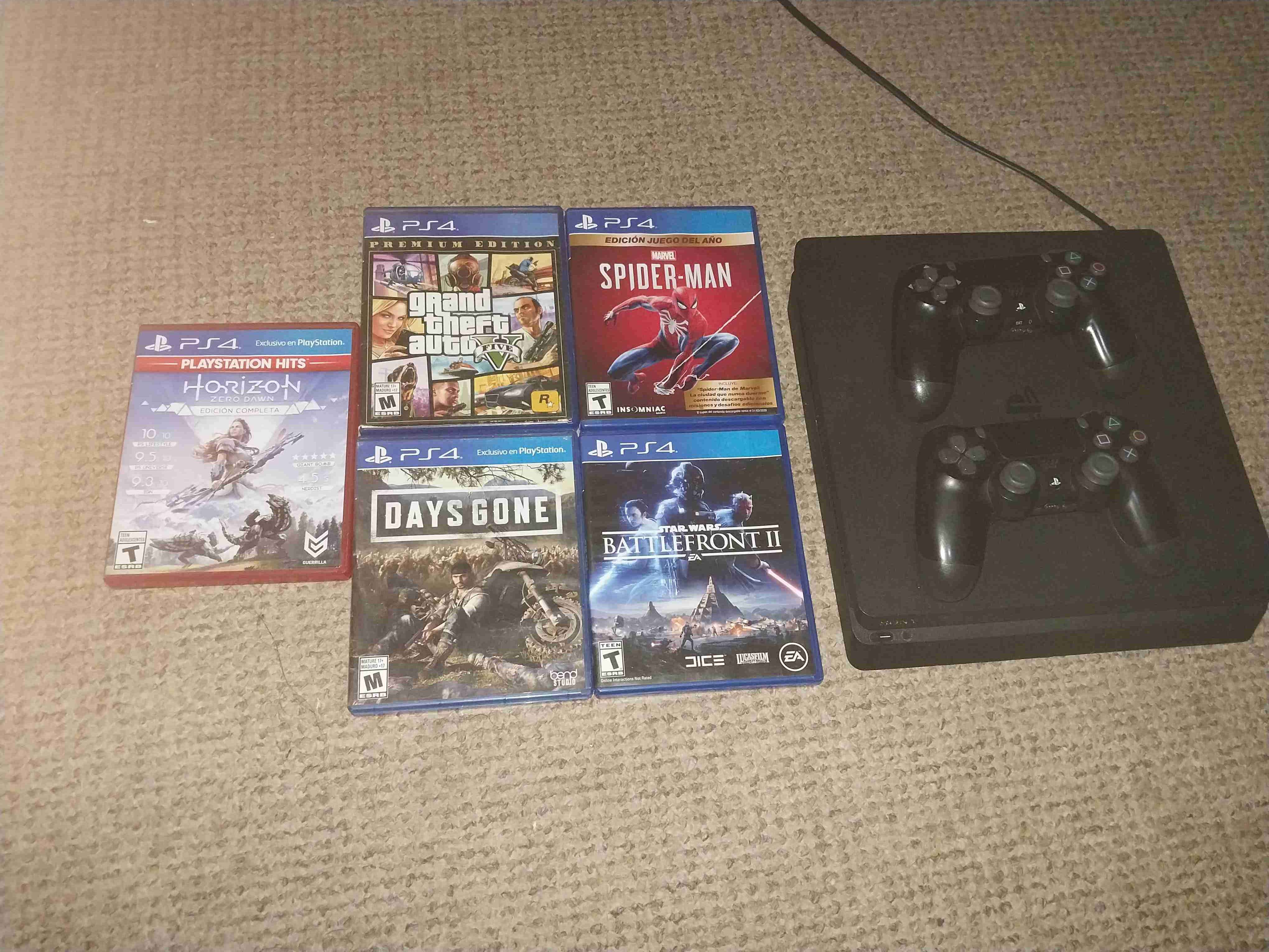 Consola PS4 slim con juegos y controles - 1