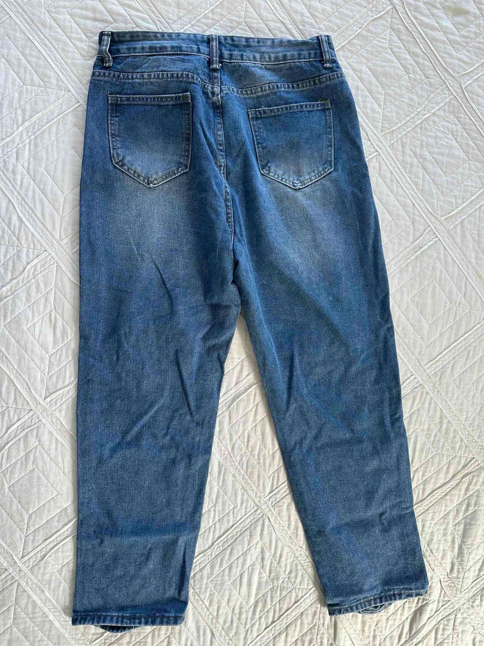 Jeans desgastados azules - miniatura 2