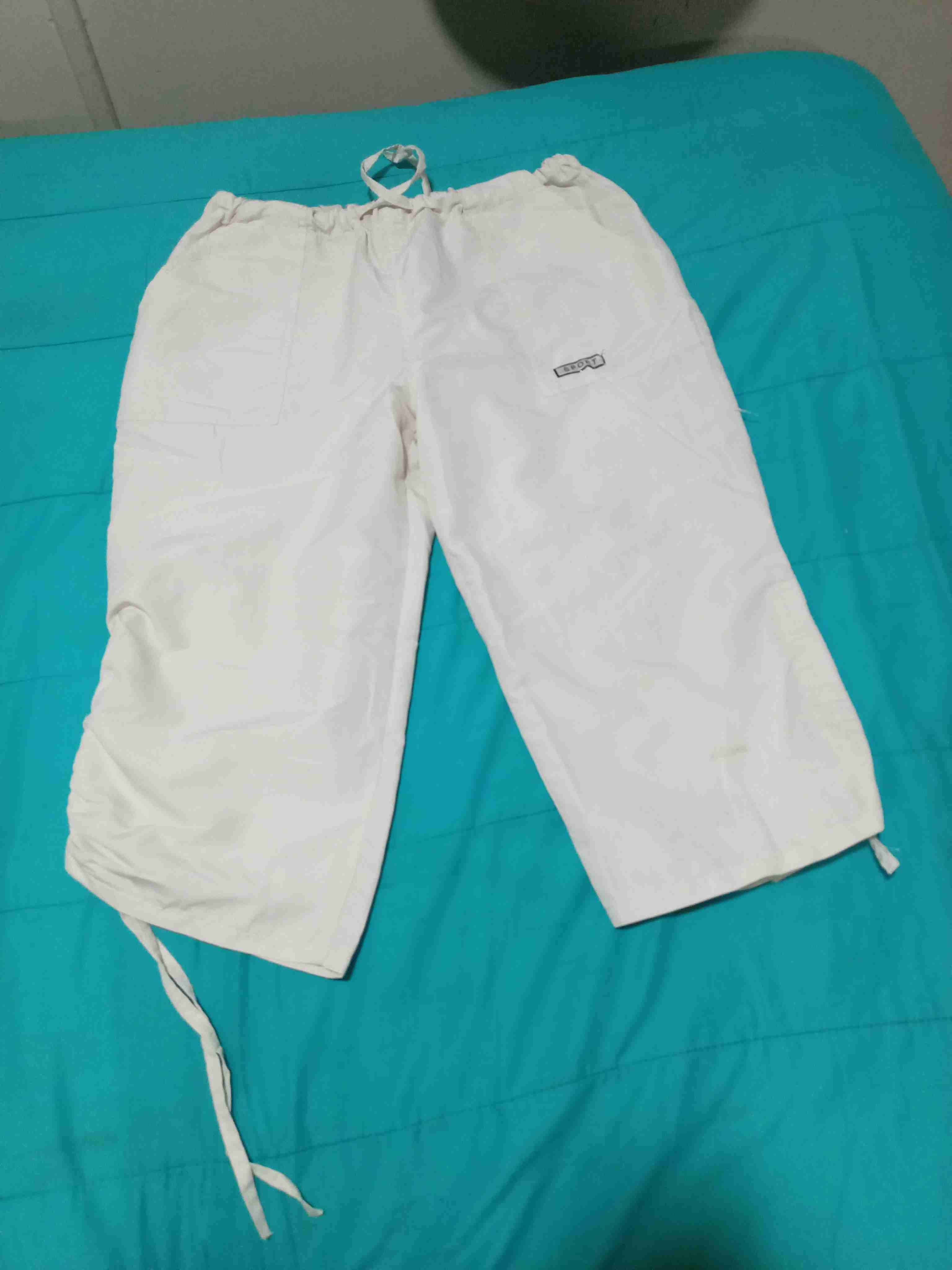 Pantalones blancos deportivos - 1