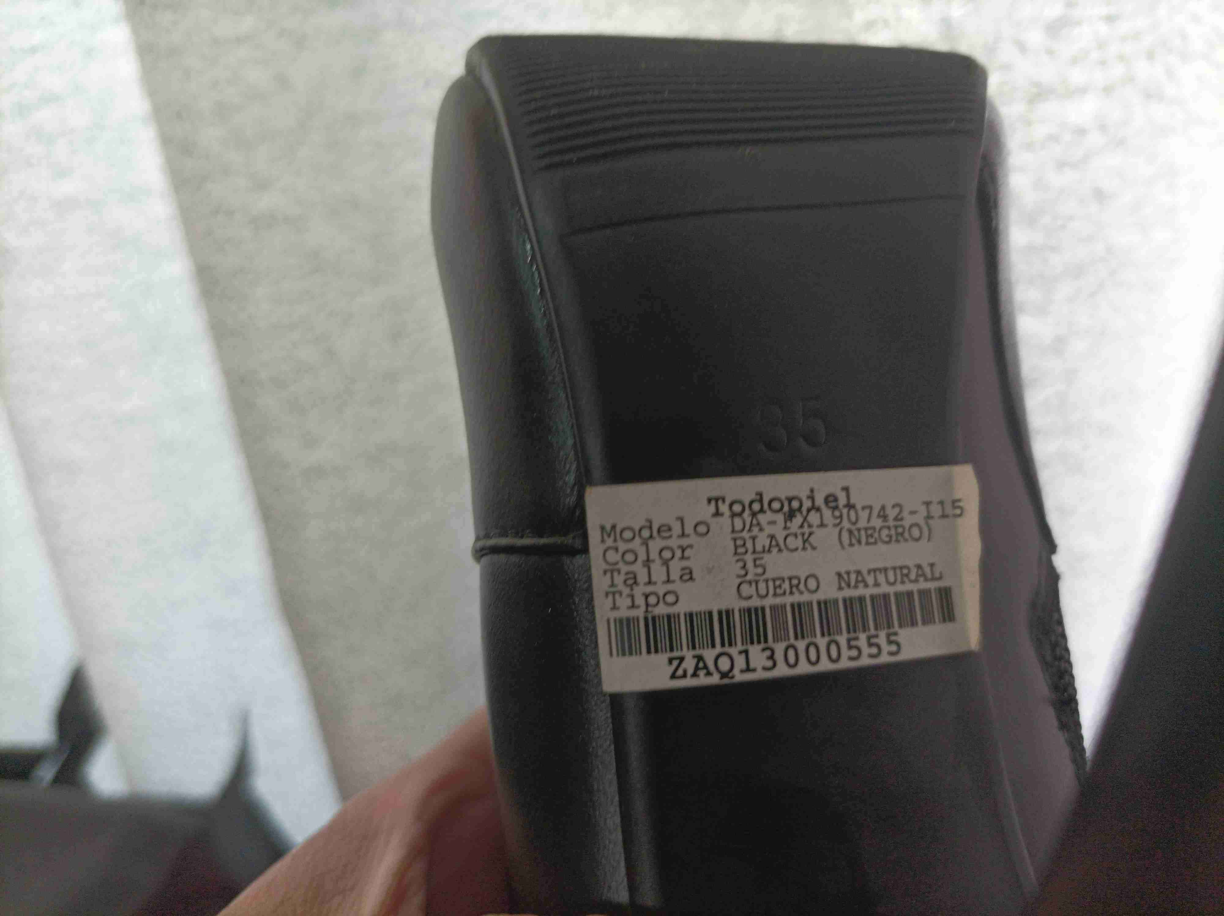 Botas negras de cuero alto - miniatura 4