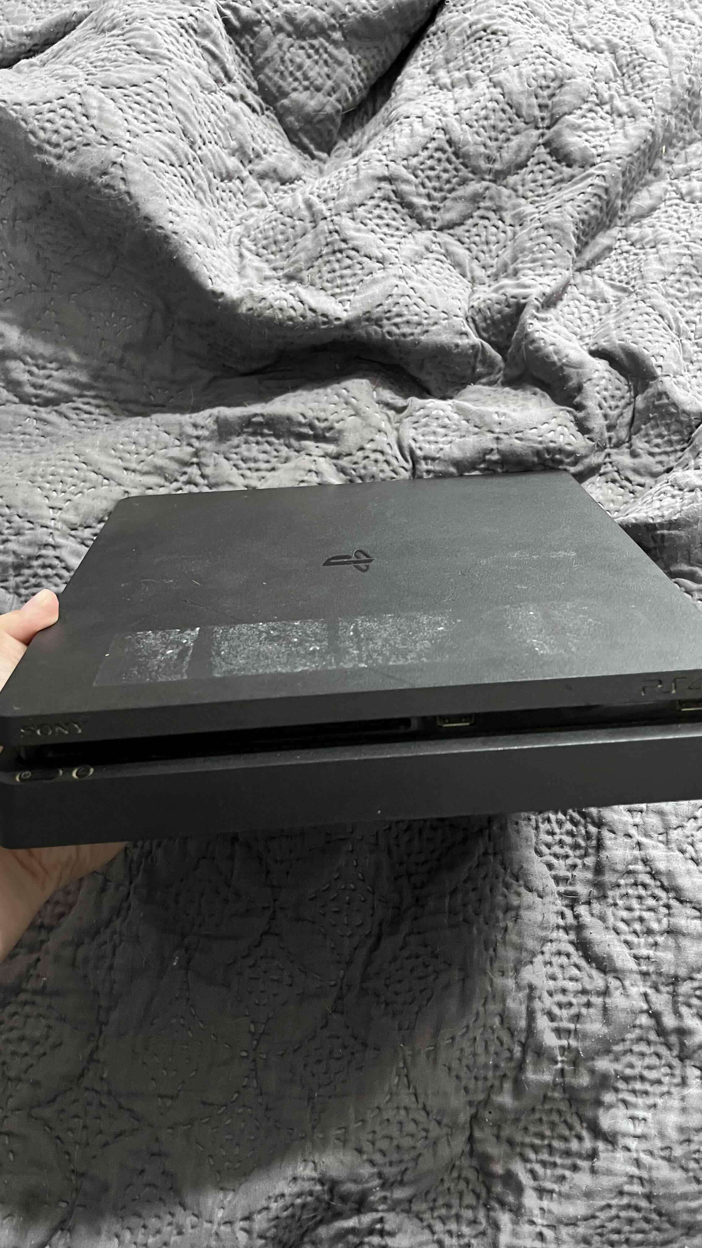 Consola PlayStation negra usada - miniatura 2