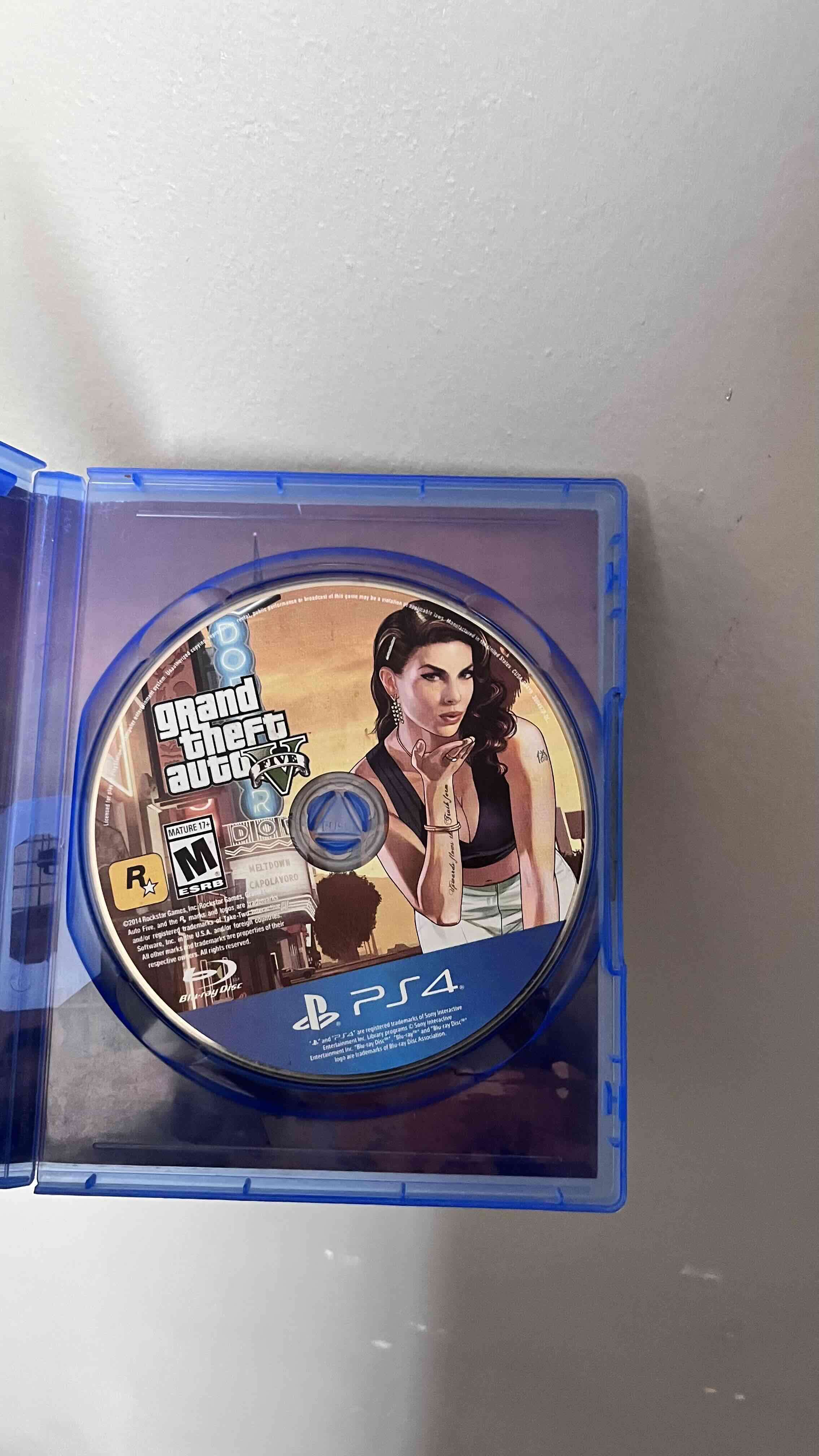 Consola PlayStation negra usada - miniatura 4