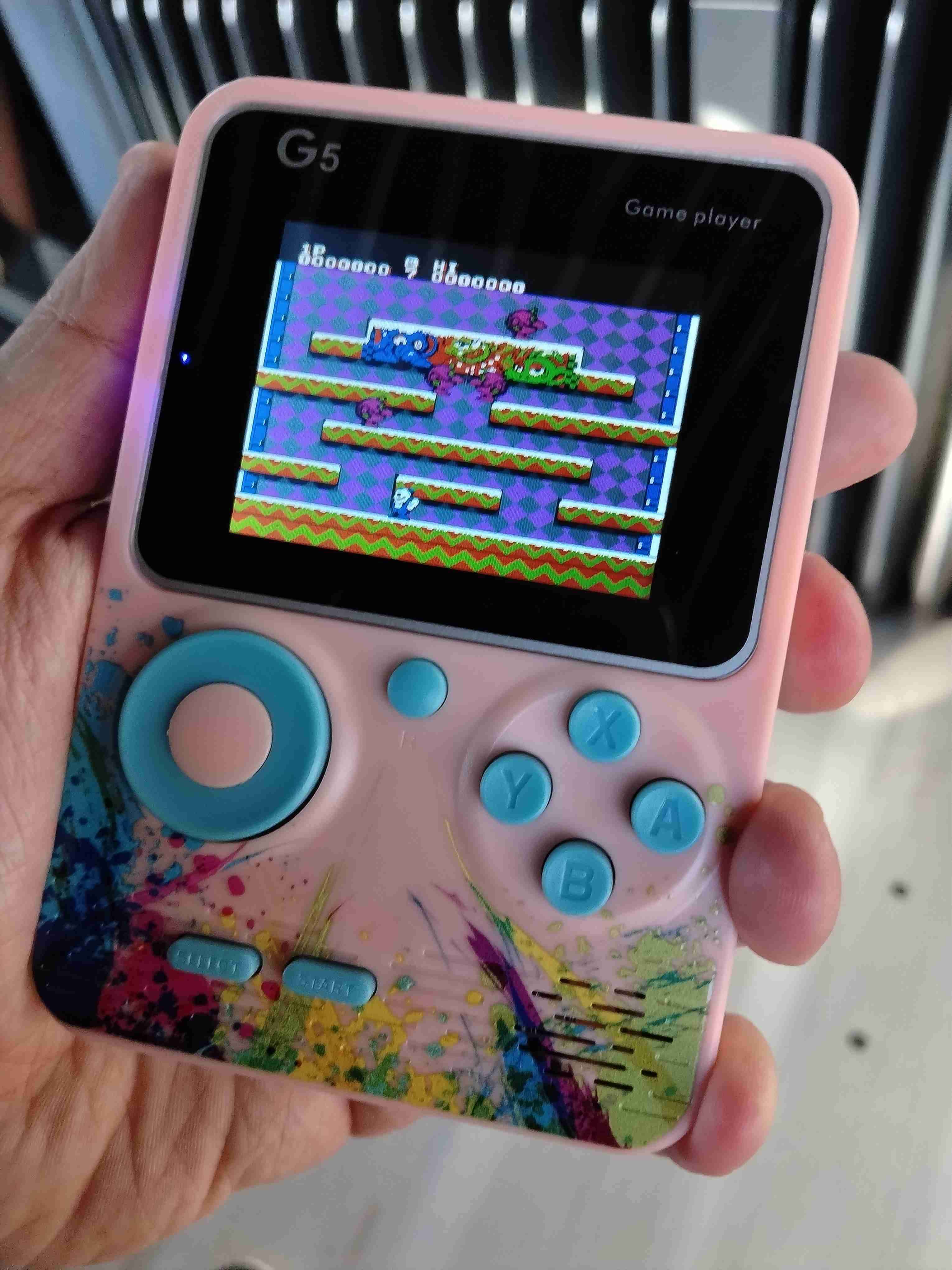 Consola de juegos portátil G5 rosada juegos de nes - miniatura 1