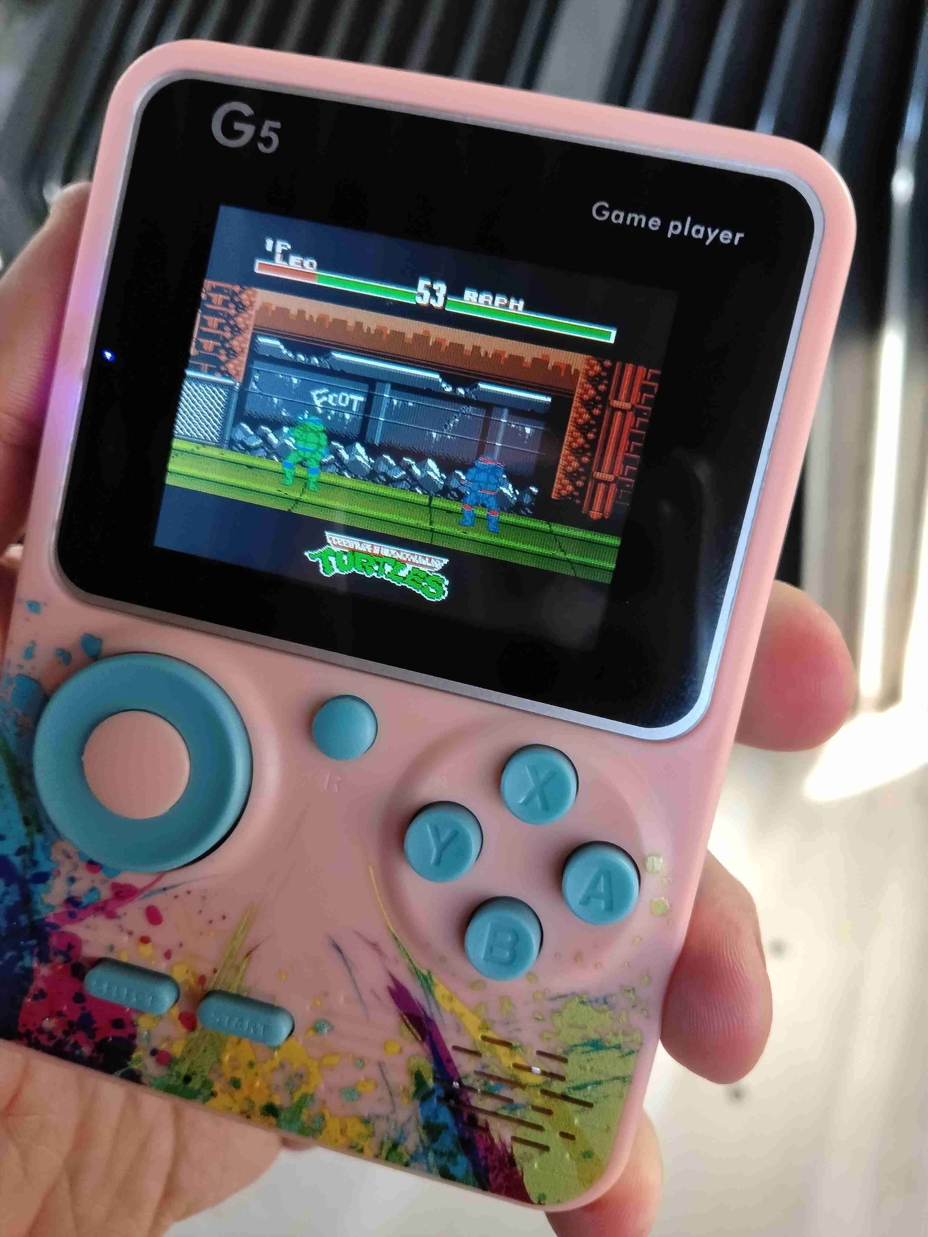 Consola de juegos portátil G5 rosada juegos de nes - miniatura 2