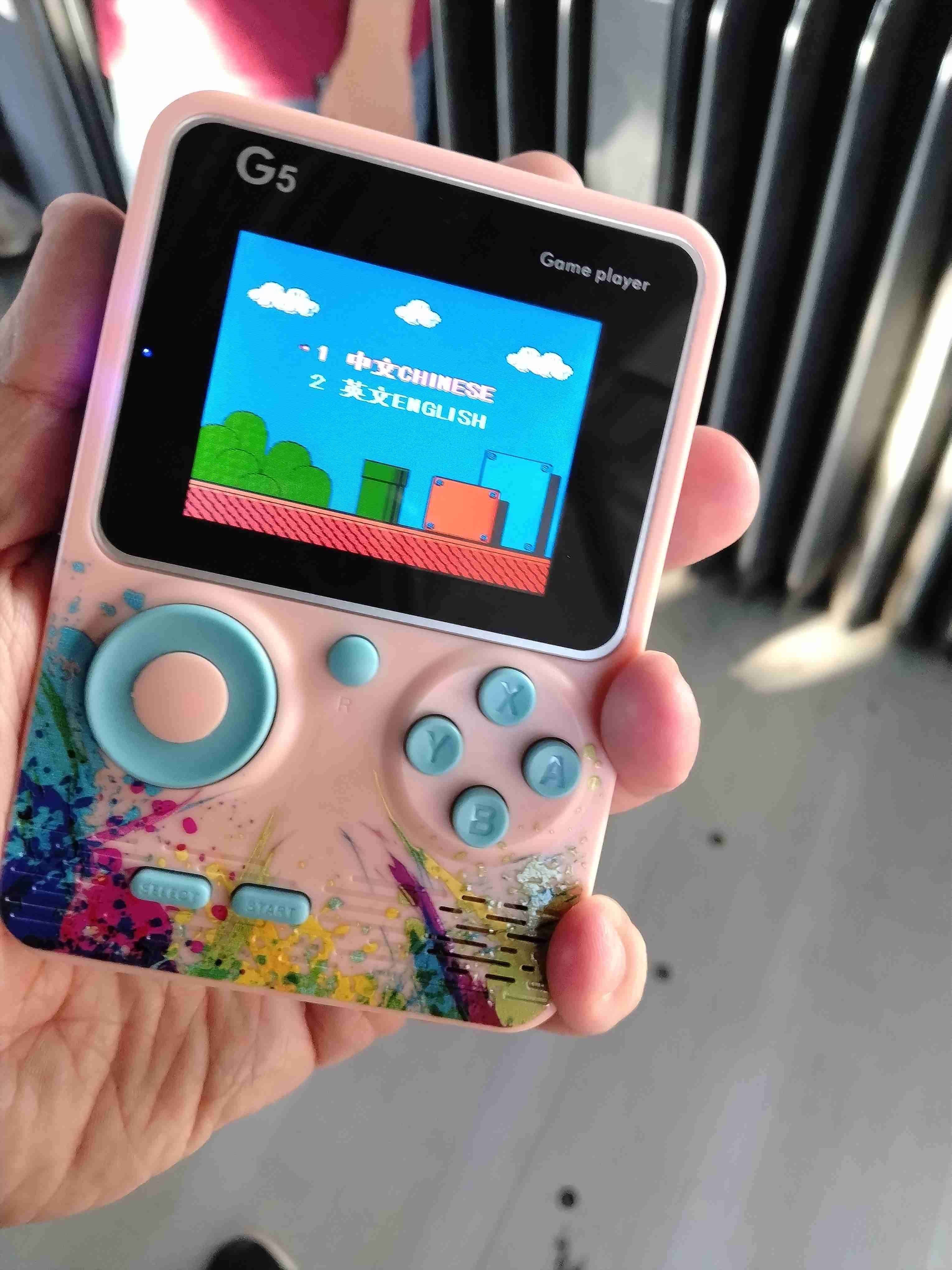 Consola de juegos portátil G5 rosada juegos de nes - miniatura 4