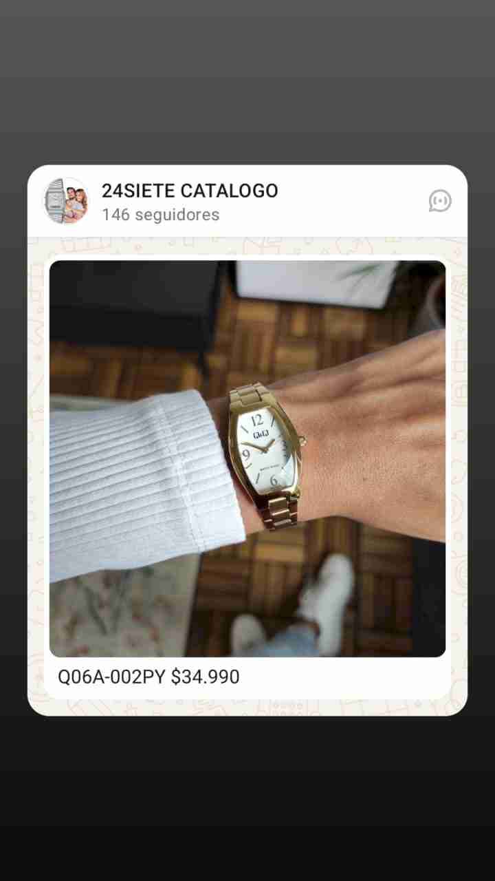 Reloj dorado con pulsera metálica - miniatura 1