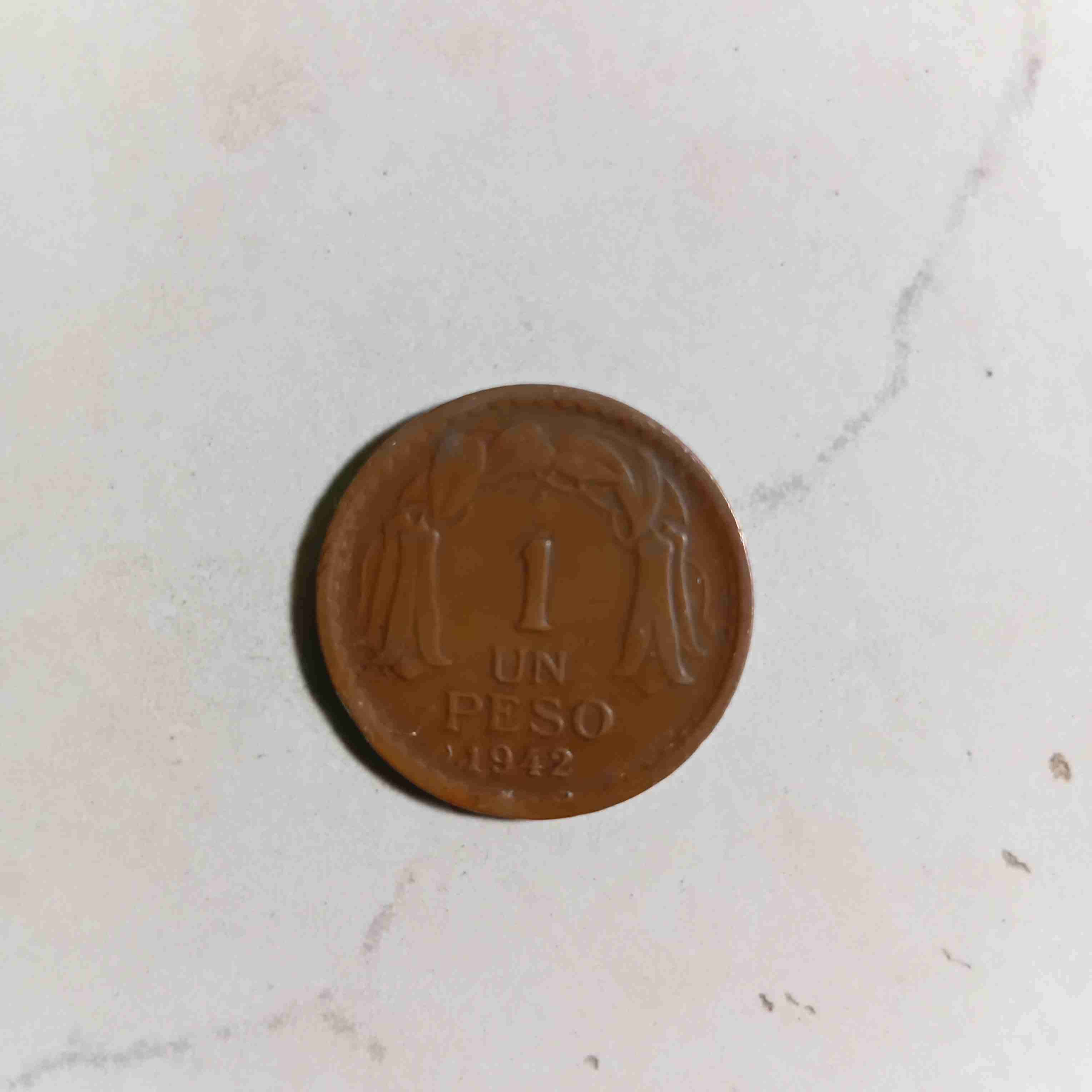 Moneda antigua 1 peso 1942 - 1