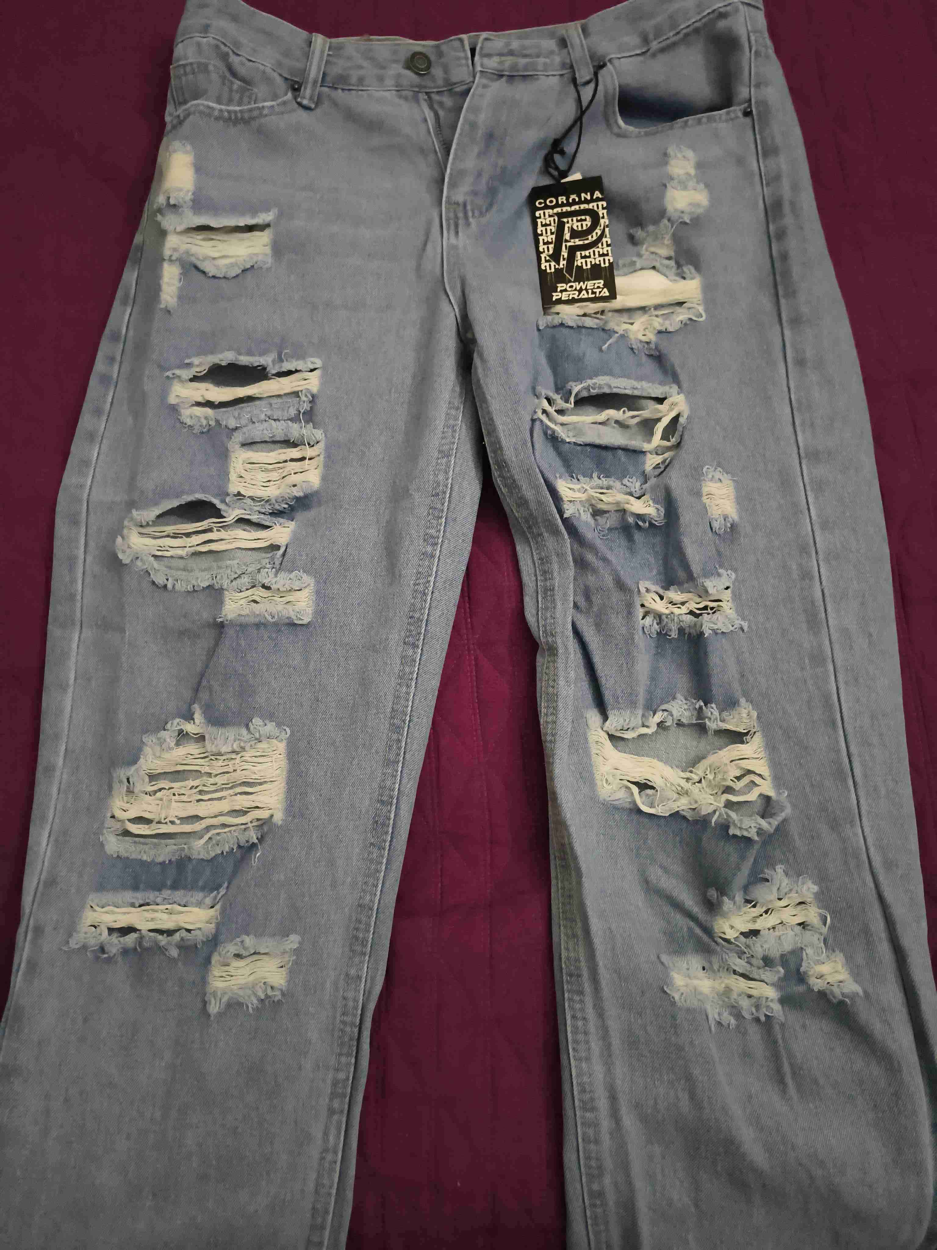 Jeans desgastados azul claro - miniatura 1