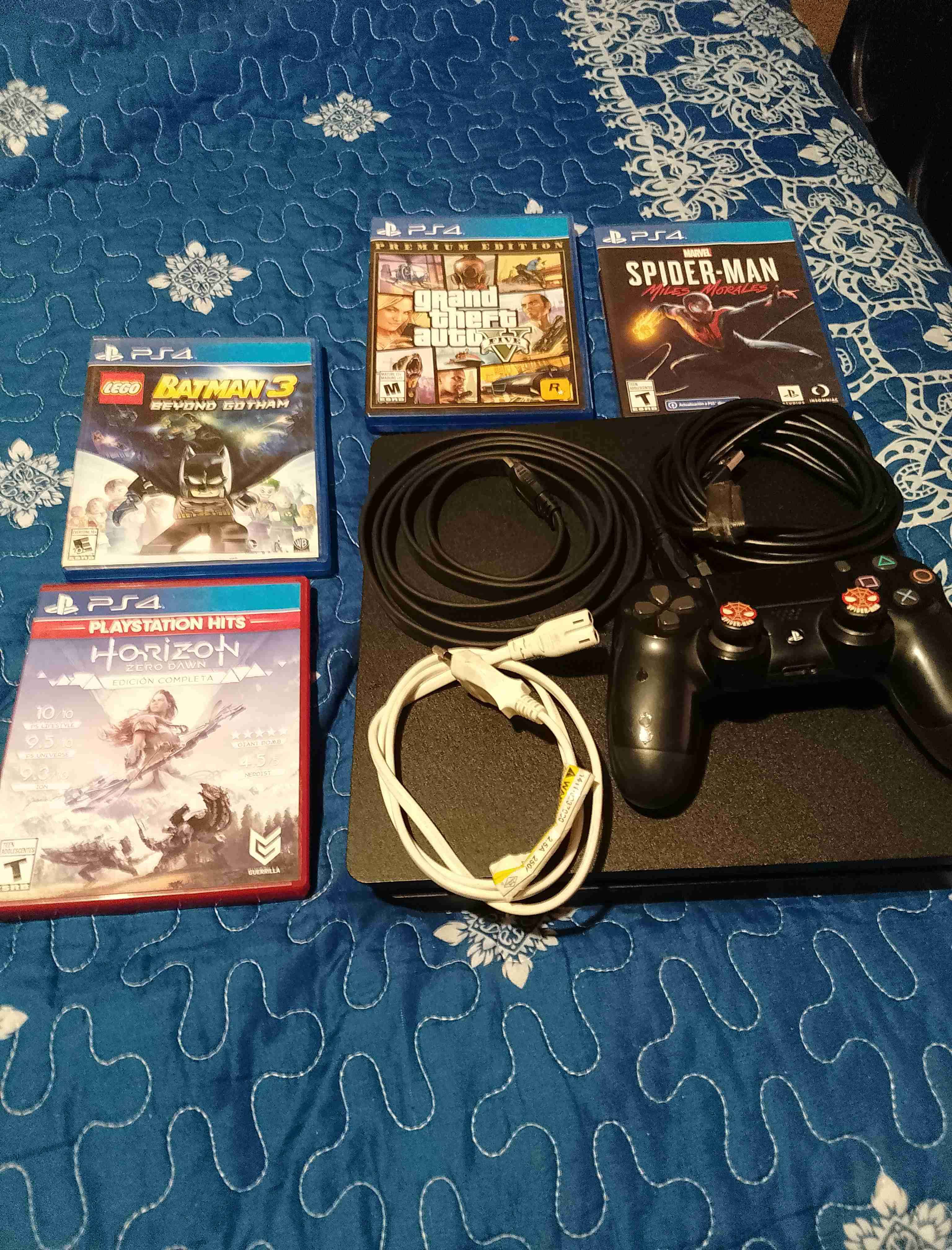 Consola PS4 con juegos y accesorios - miniatura 2