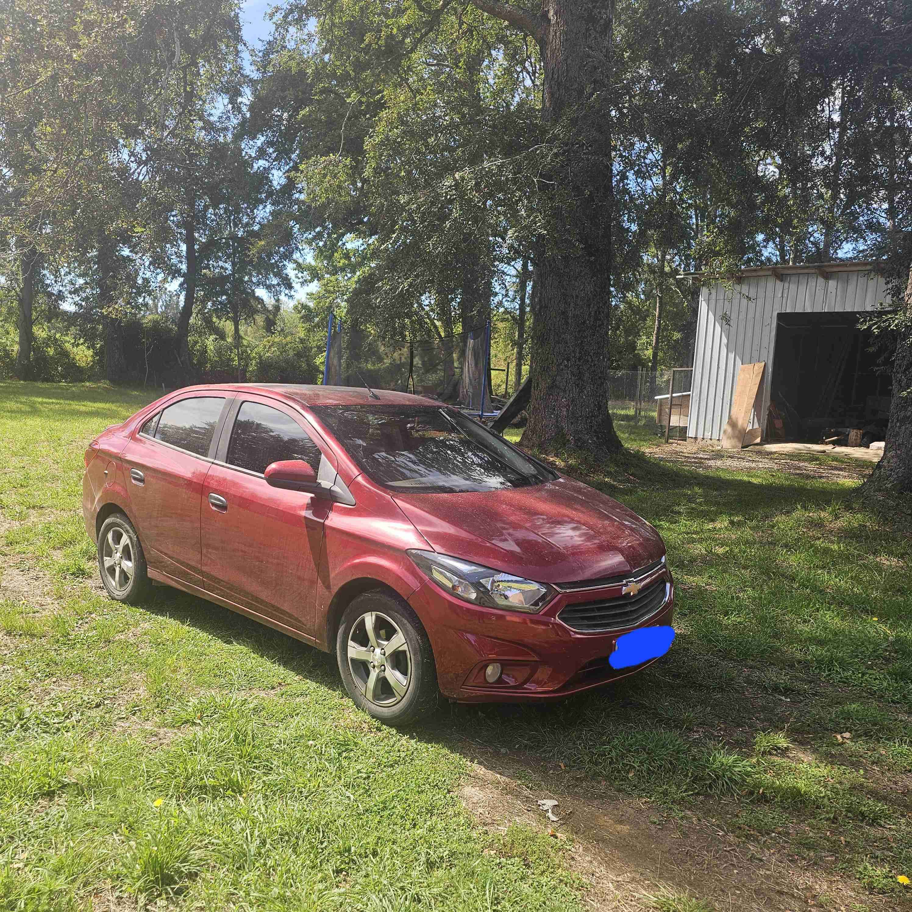 Auto Chevrolet Prisma rojo - miniatura 2