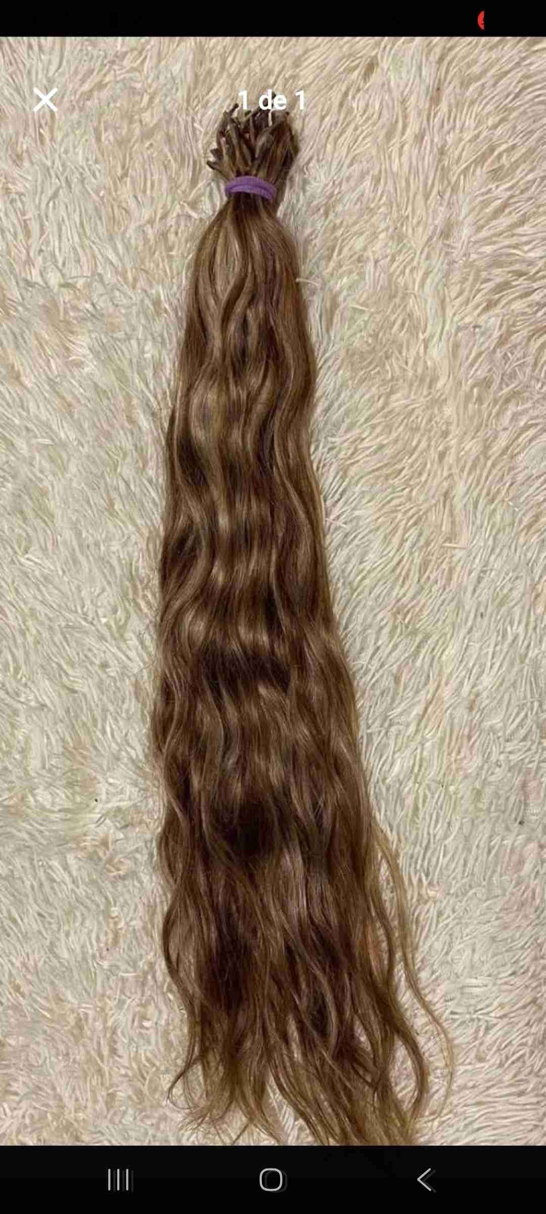 Extensión de cabello castaño largo