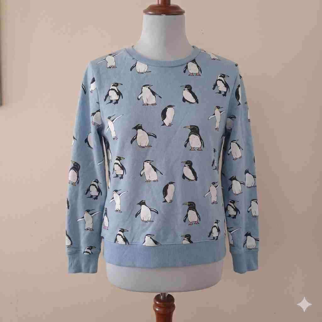 Suéter azul con pingüinos H&M talla 8-10 - miniatura 1