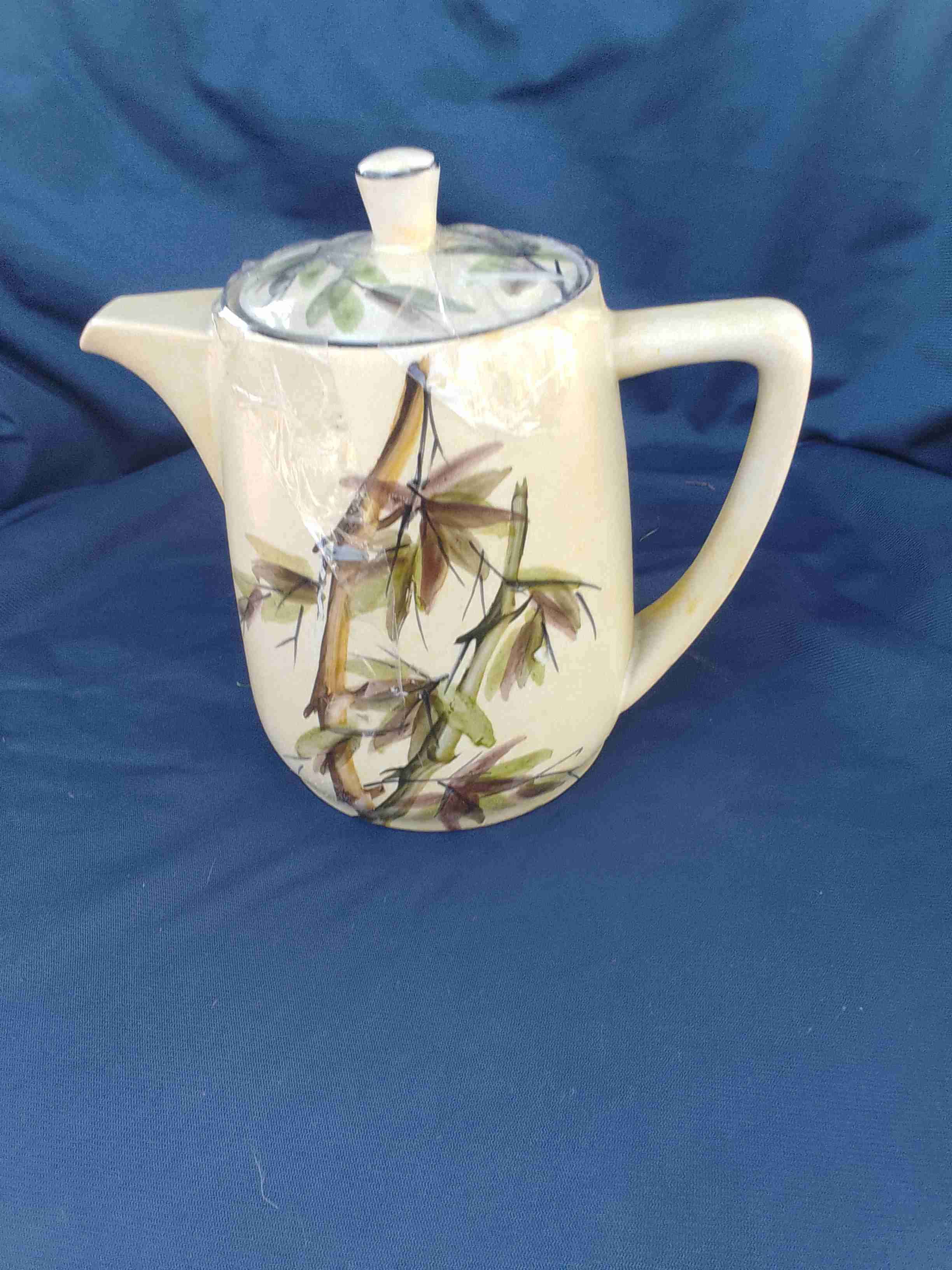 Tetera de cerámica con diseño floral - miniatura 1