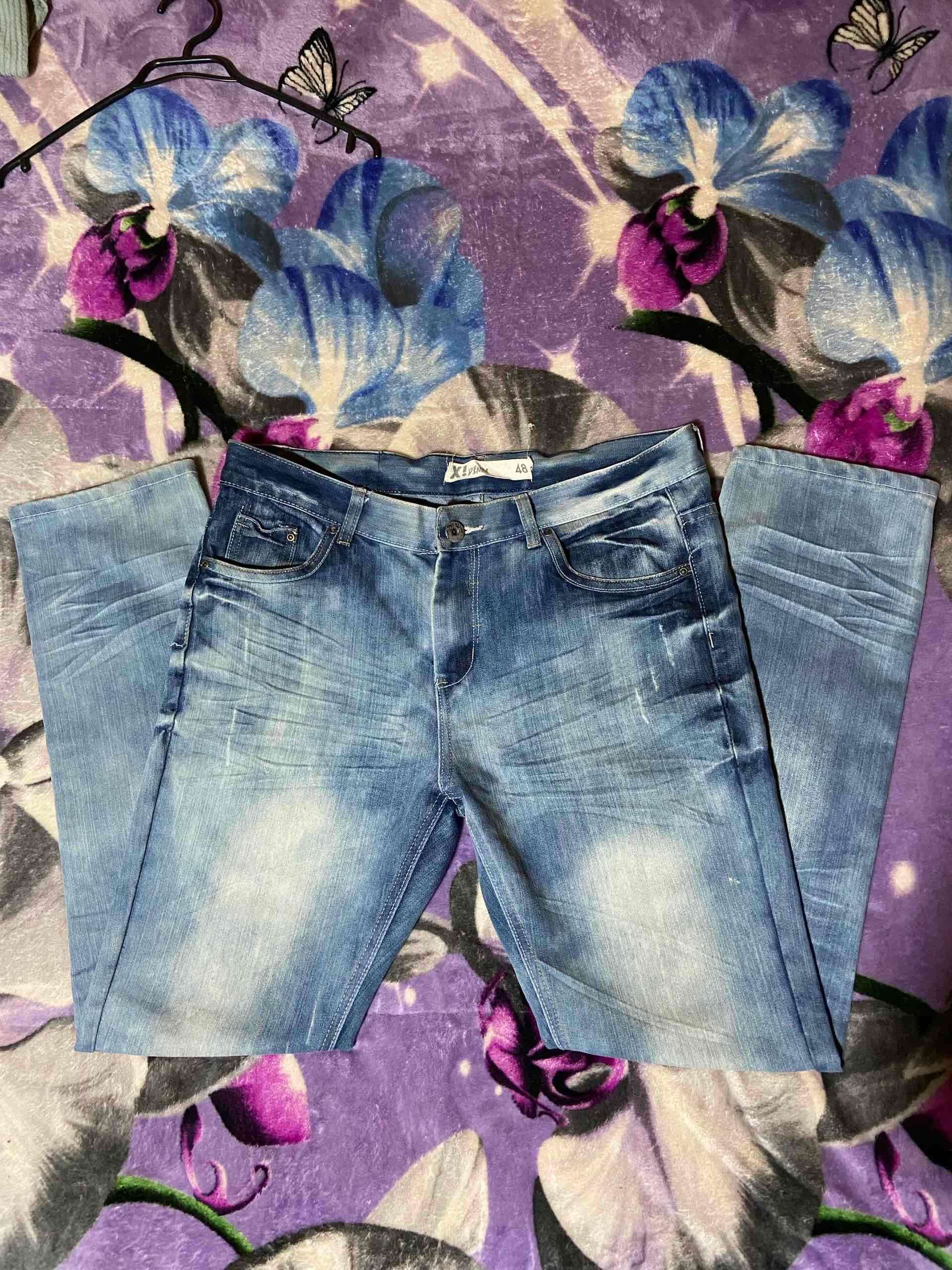 Jeans azules desgastados - miniatura 1