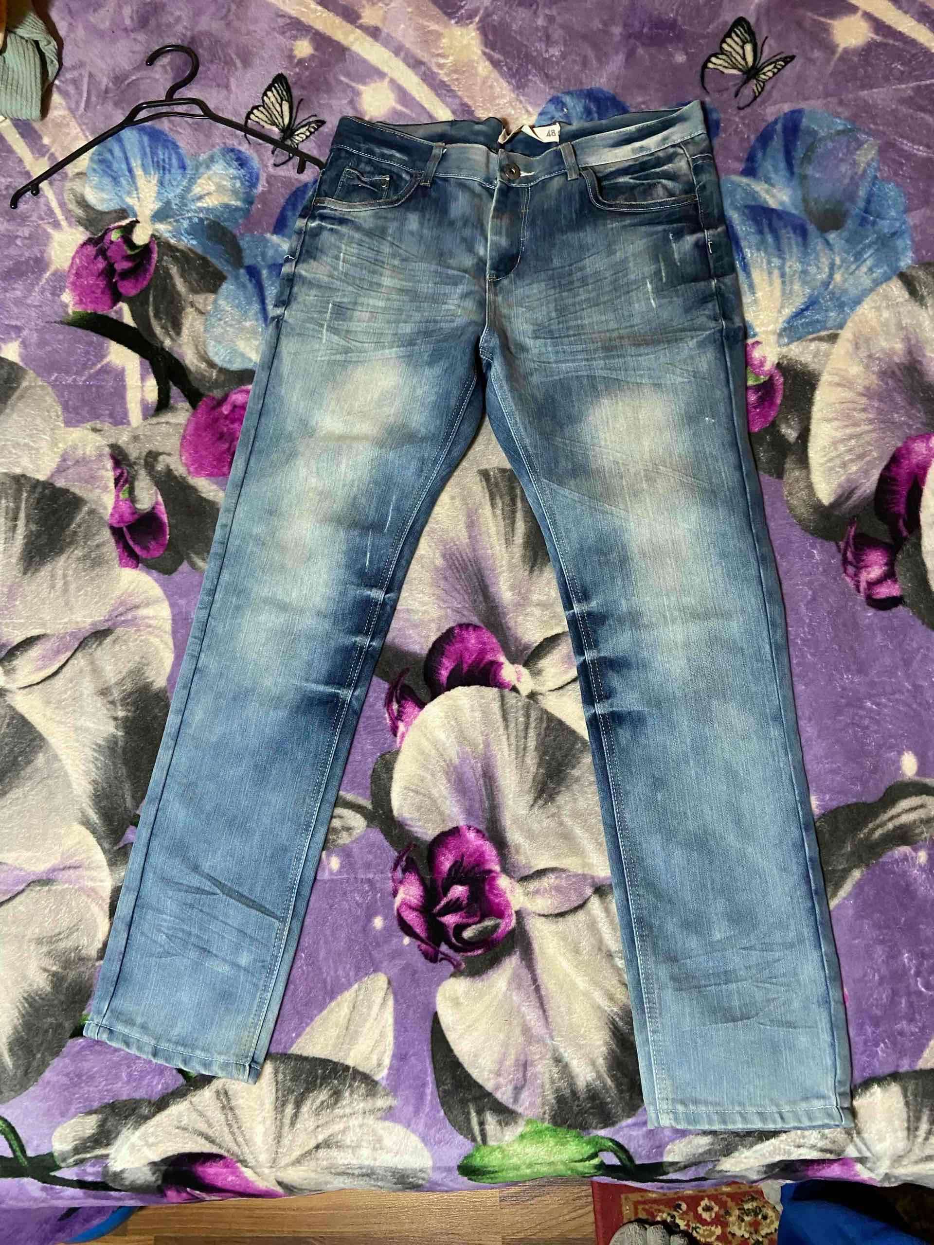 Jeans azules desgastados - miniatura 3