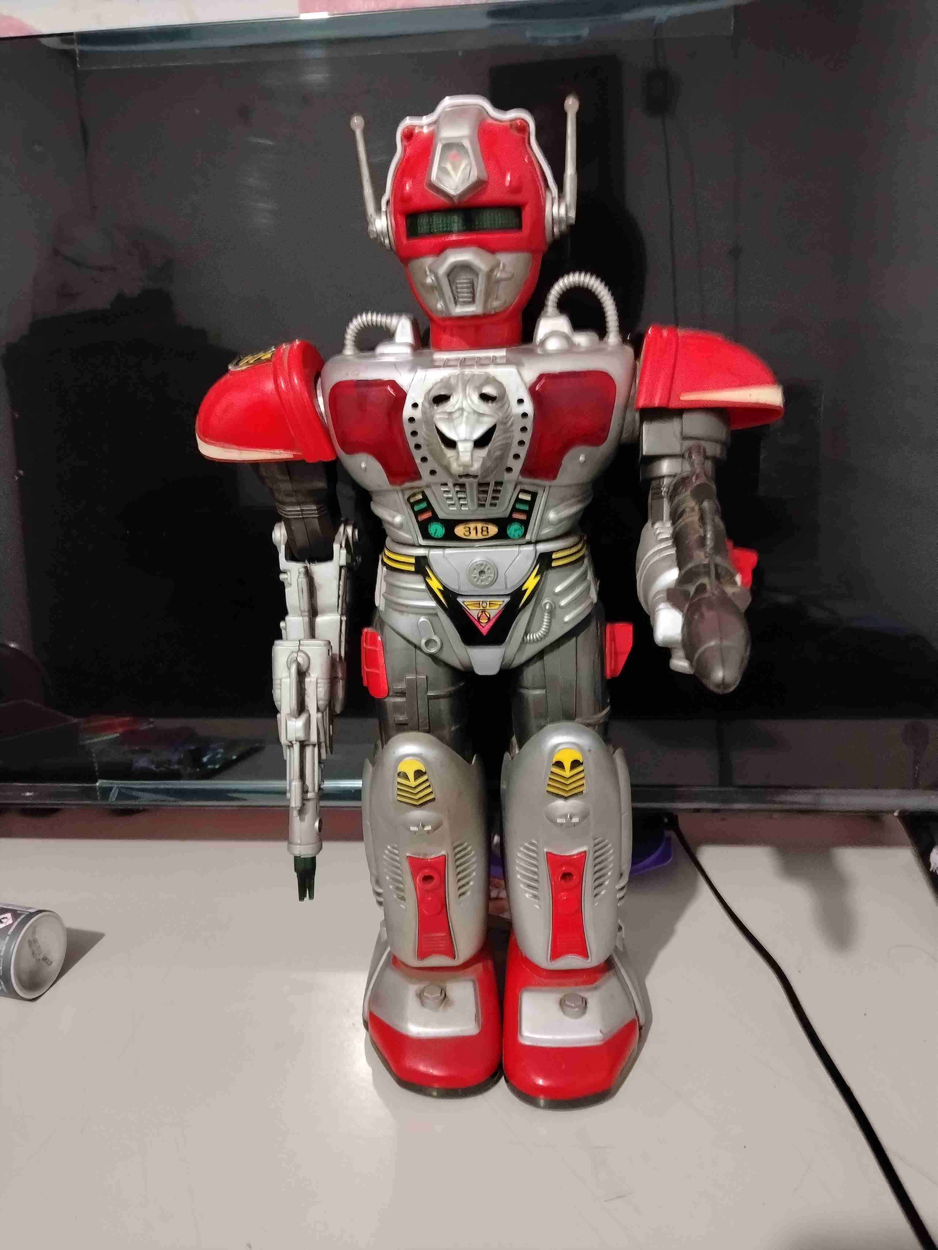 Robot juguete rojo y plateado - miniatura 1