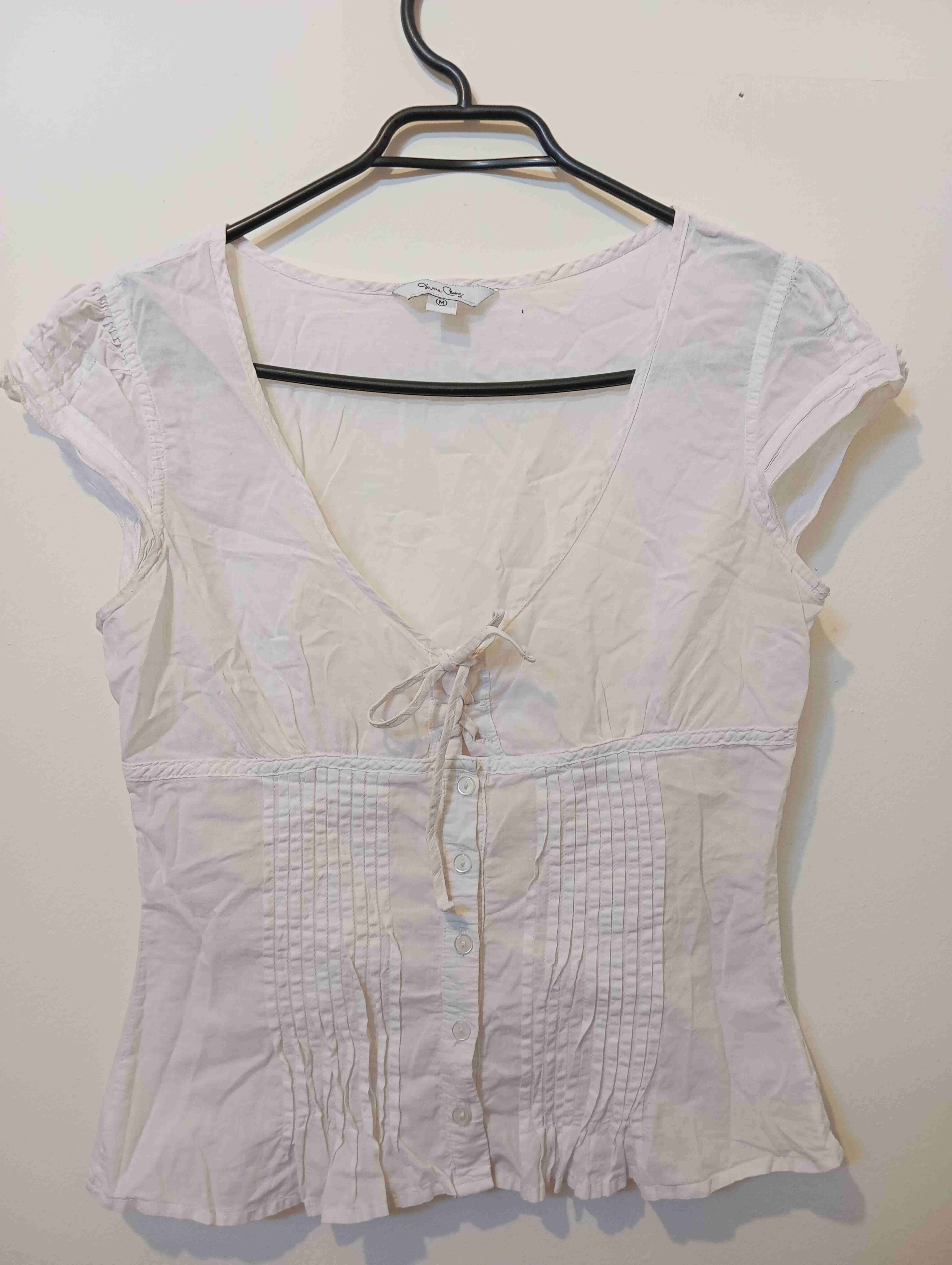 Blusa blanca con botones - miniatura 1