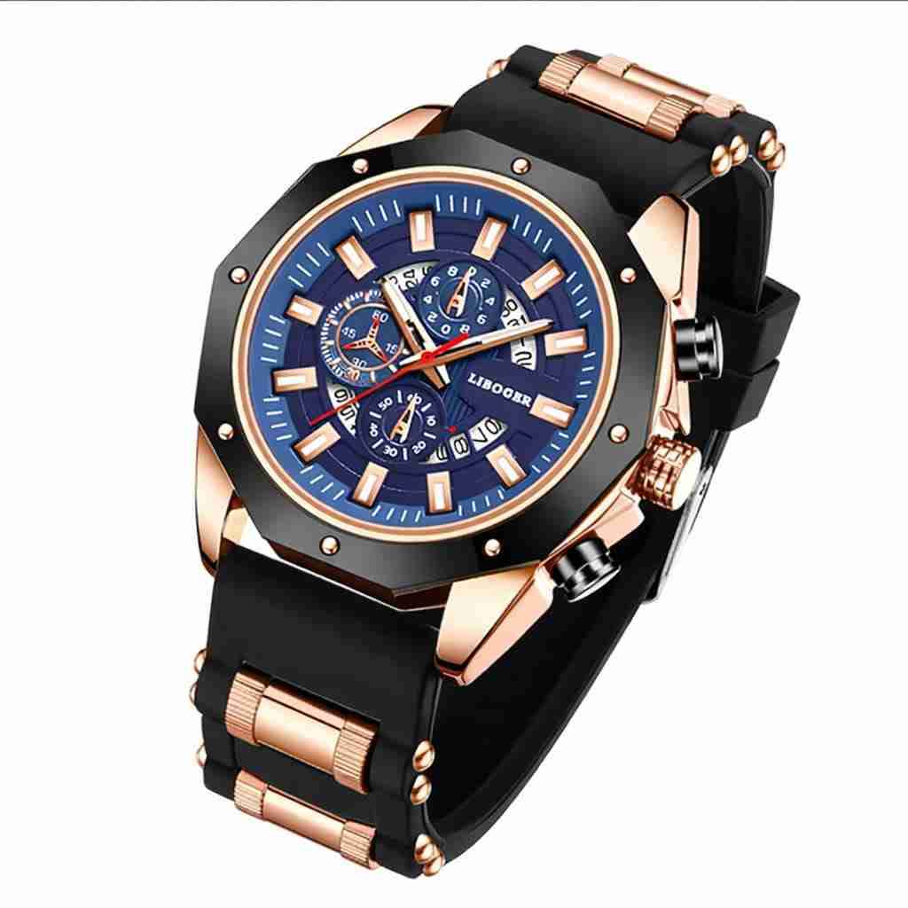 Reloj deportivo negro y dorado - miniatura 1