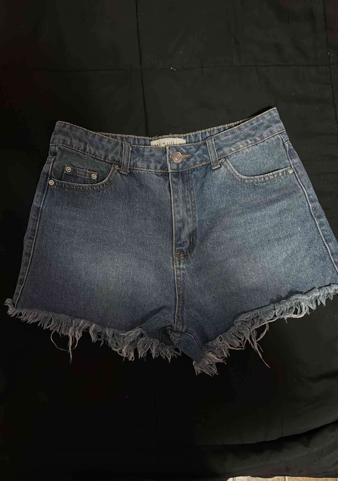 Shorts de mezclilla desgastados - miniatura 1