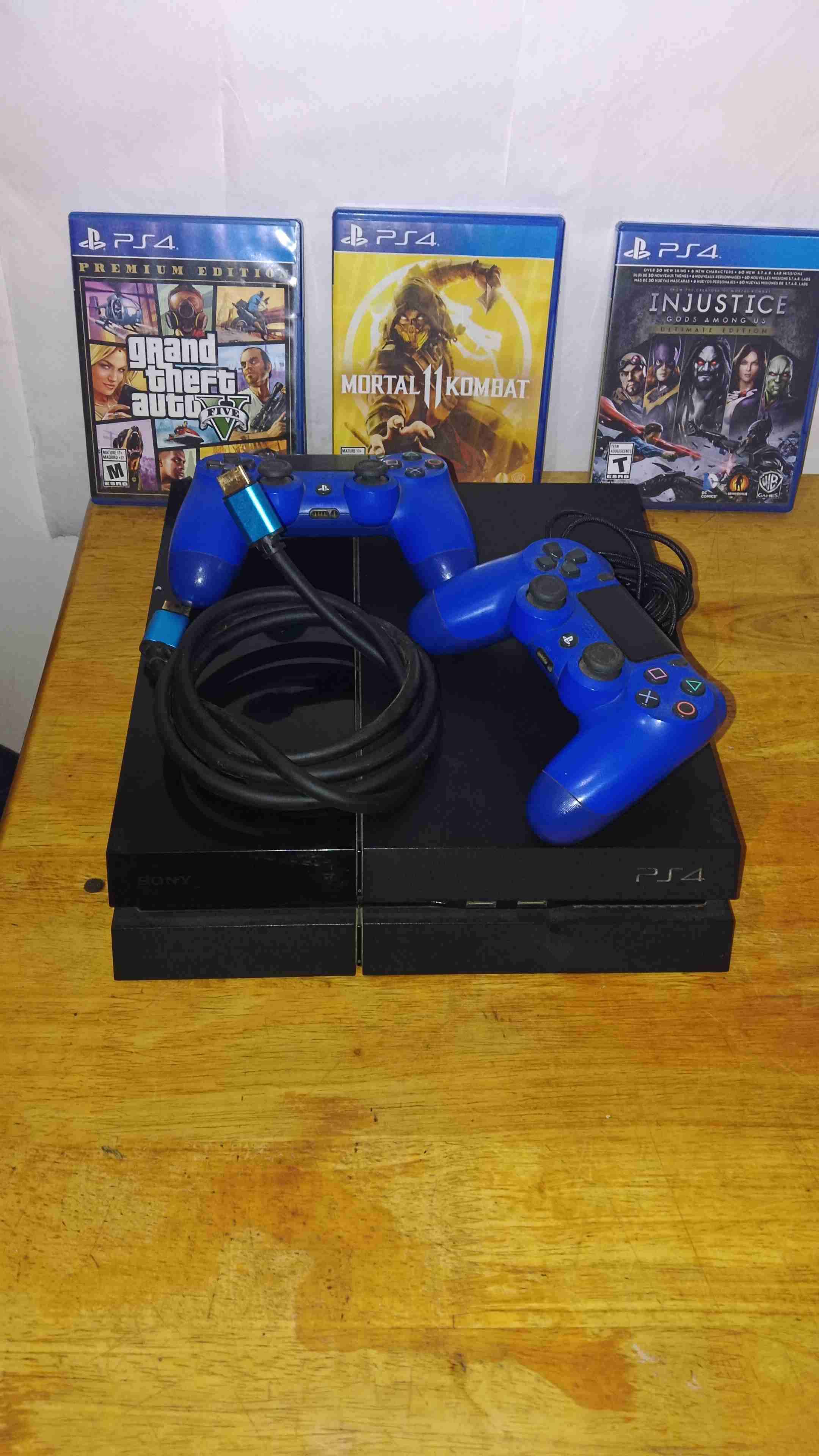 Consola PS4 con juegos y mandos - miniatura 1