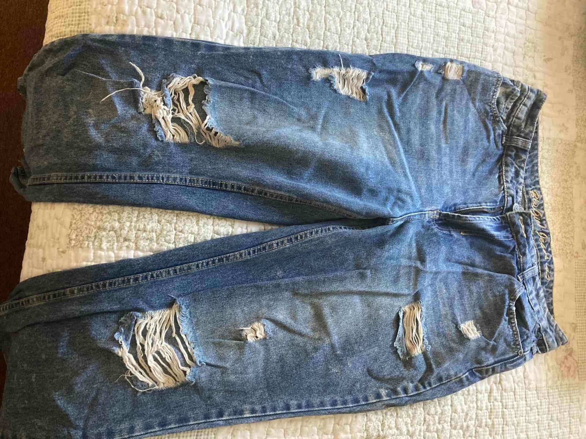 Jeans desgastados azules - miniatura 1