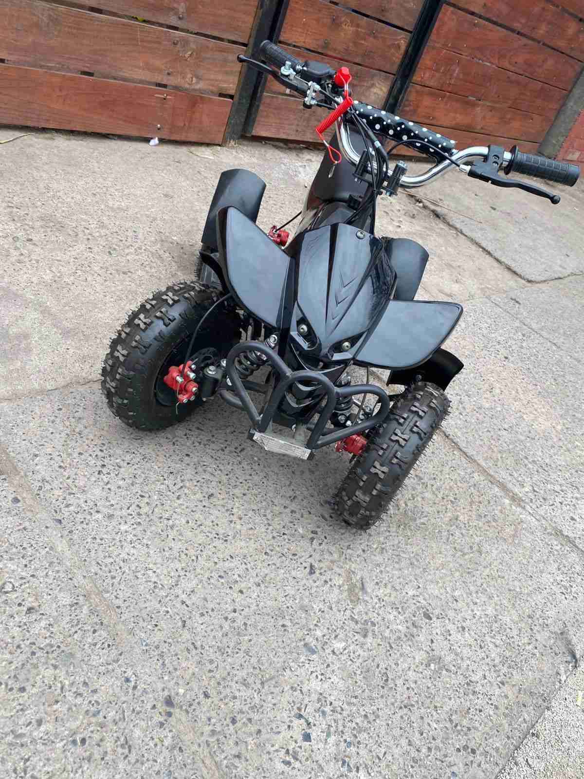 Cuatrimoto eléctrica negra 2t 49cc - miniatura 2