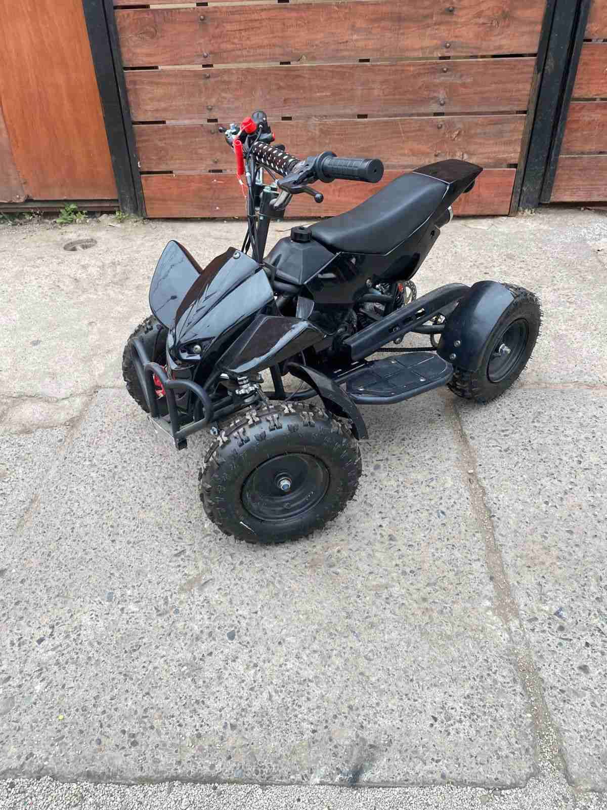 Cuatrimoto eléctrica negra 2t 49cc - miniatura 3