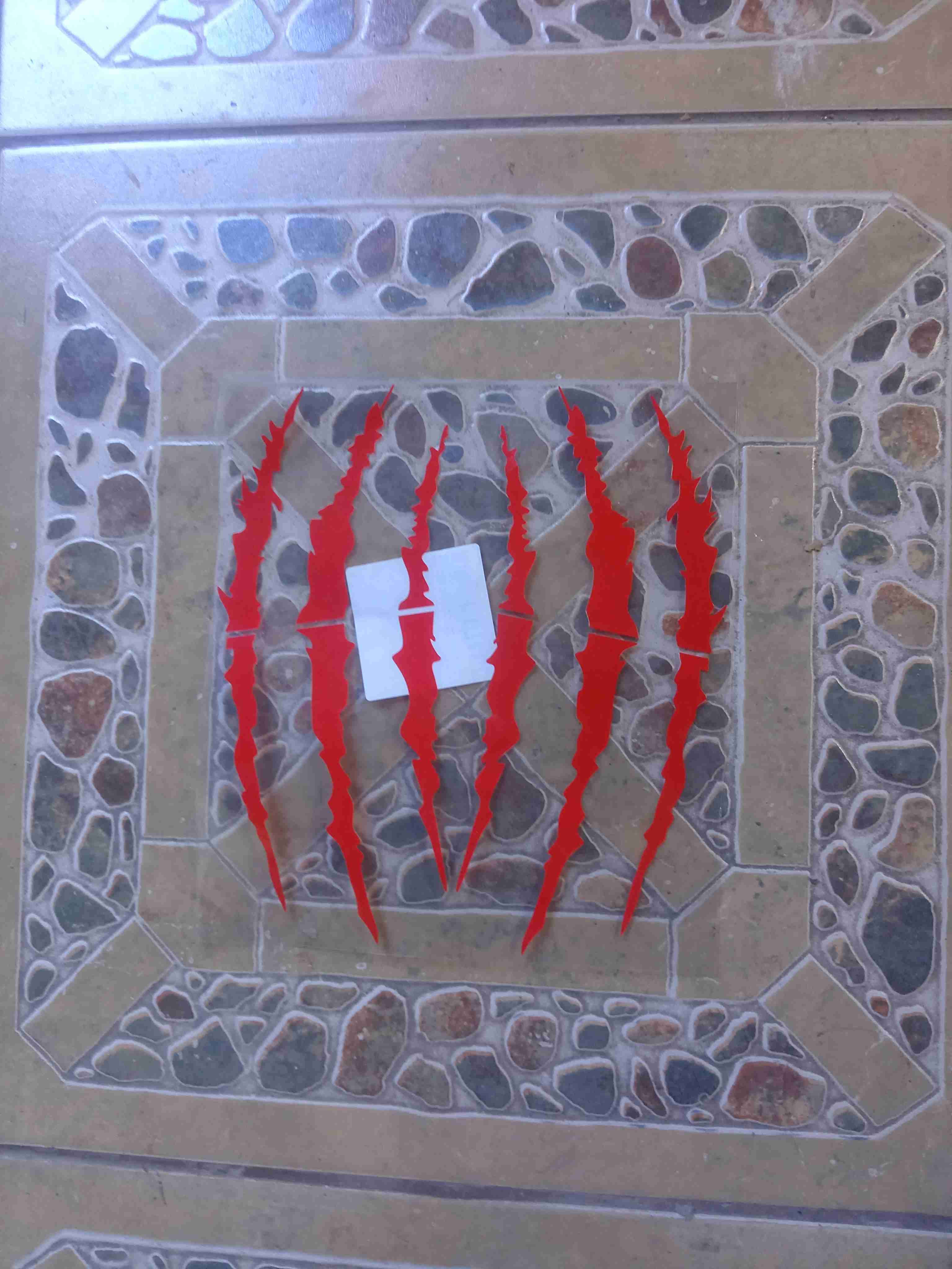 Sticker rasgaduras rojas