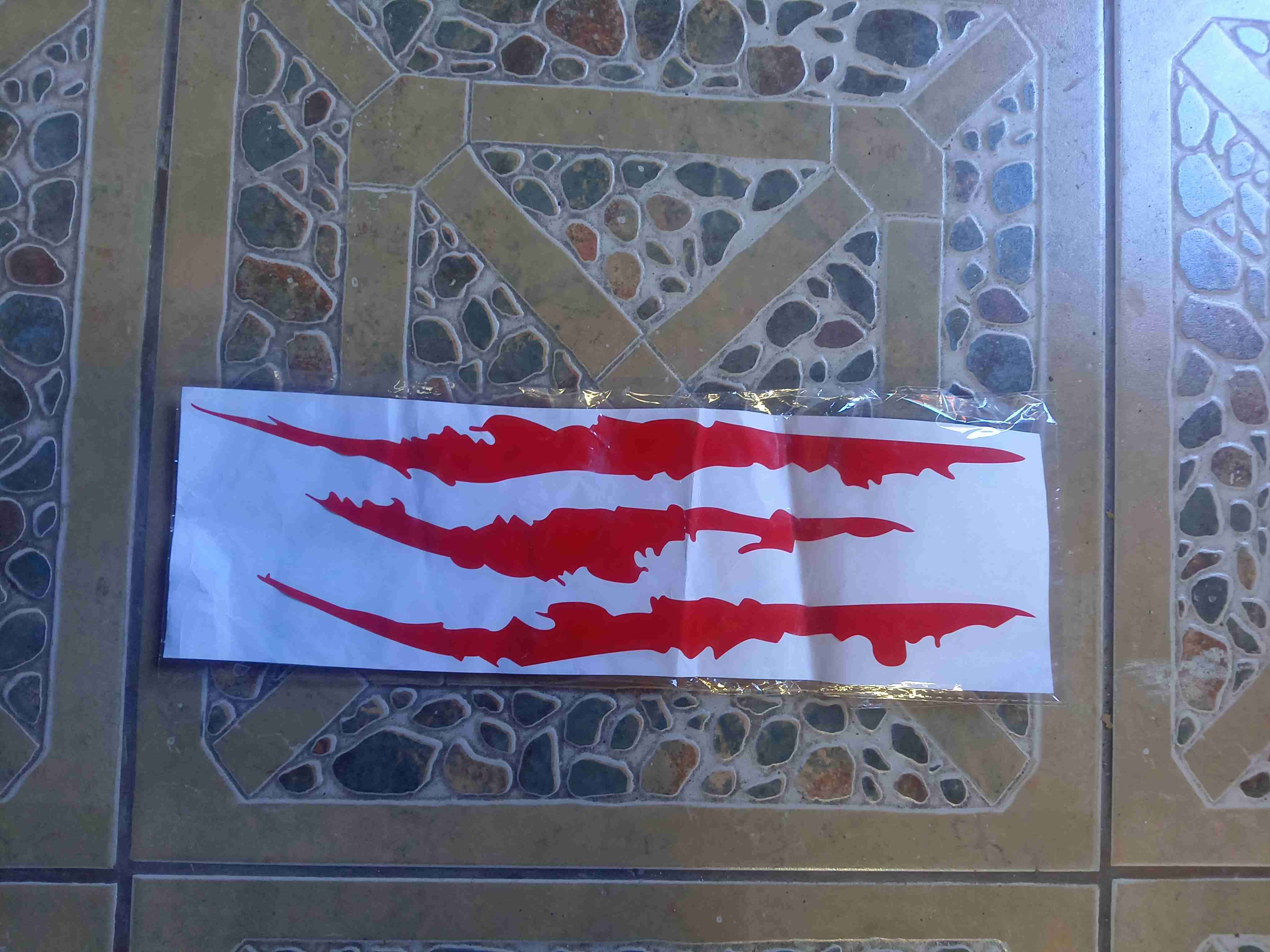 Calcomanía para auto garras rojas