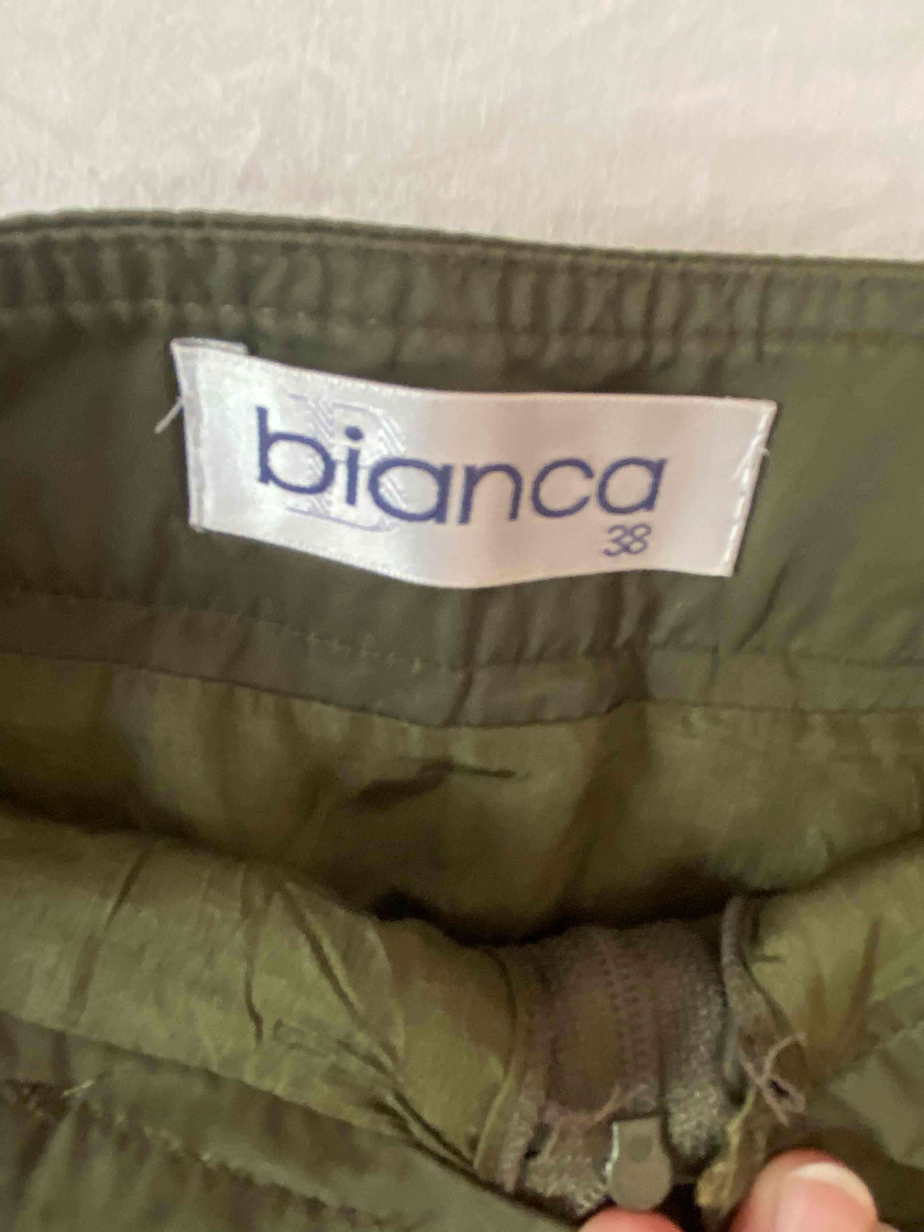 Falda verde con cremalleras - miniatura 3