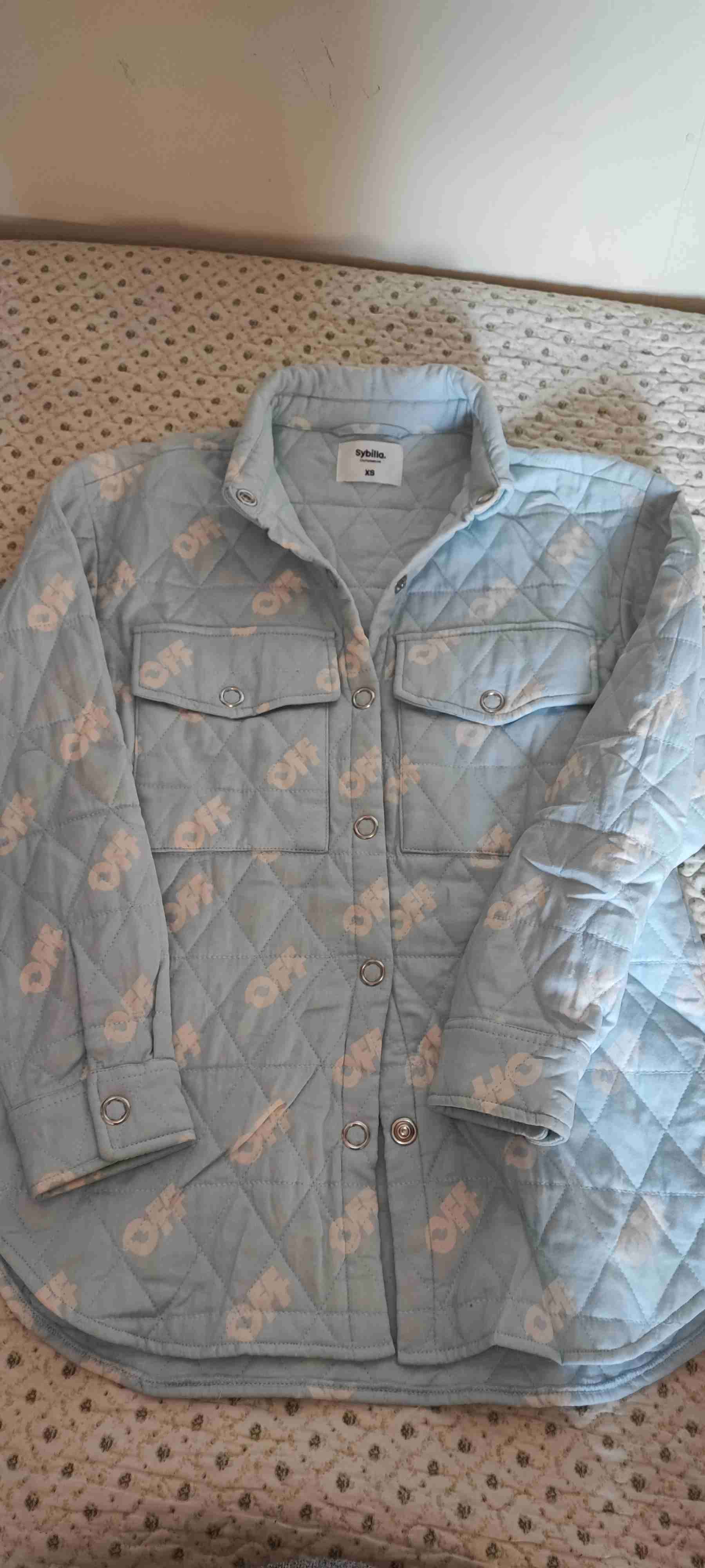 Chaqueta acolchada celeste Sybilla