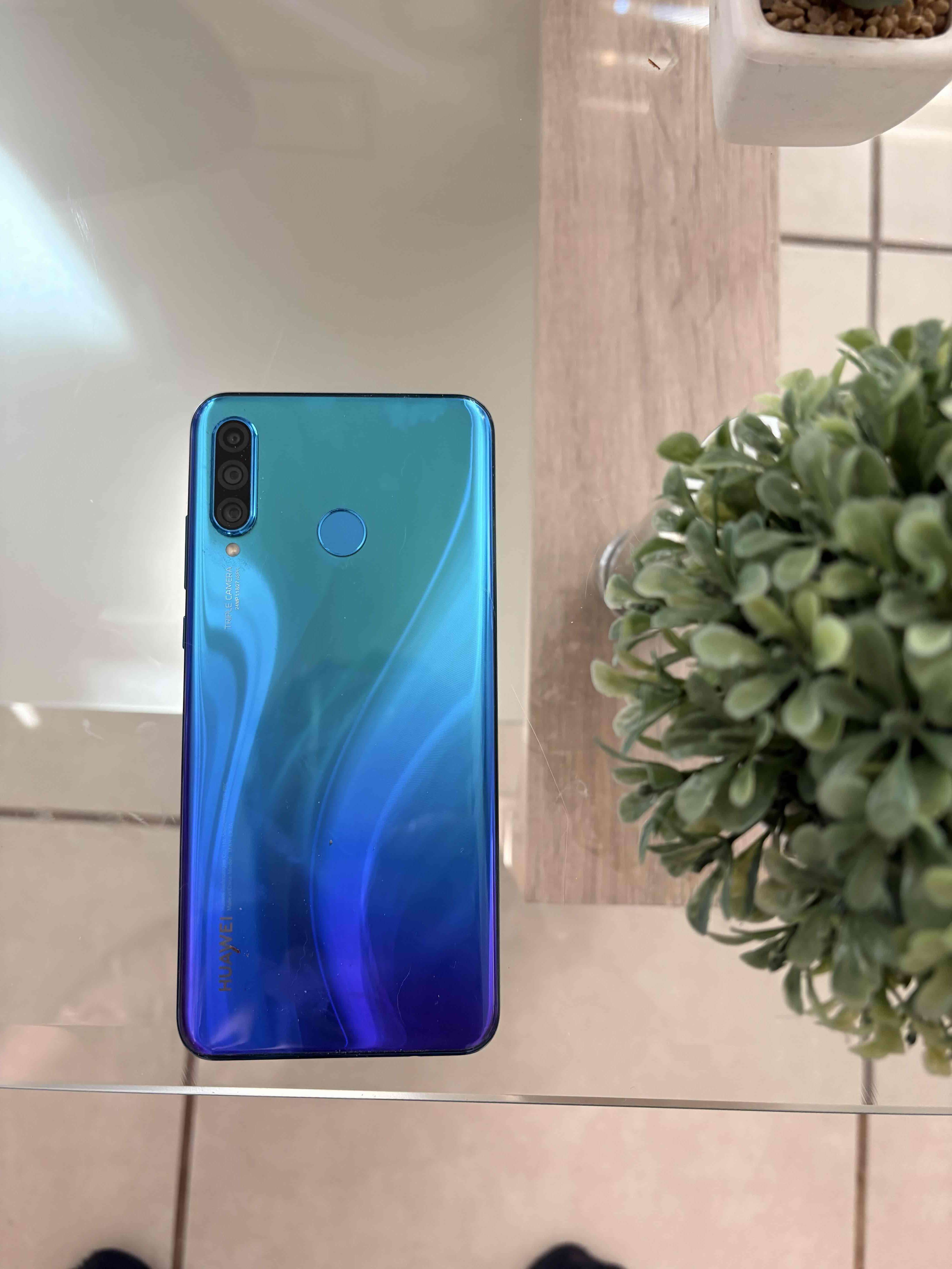 Celular Huawei azul degradado - miniatura 1