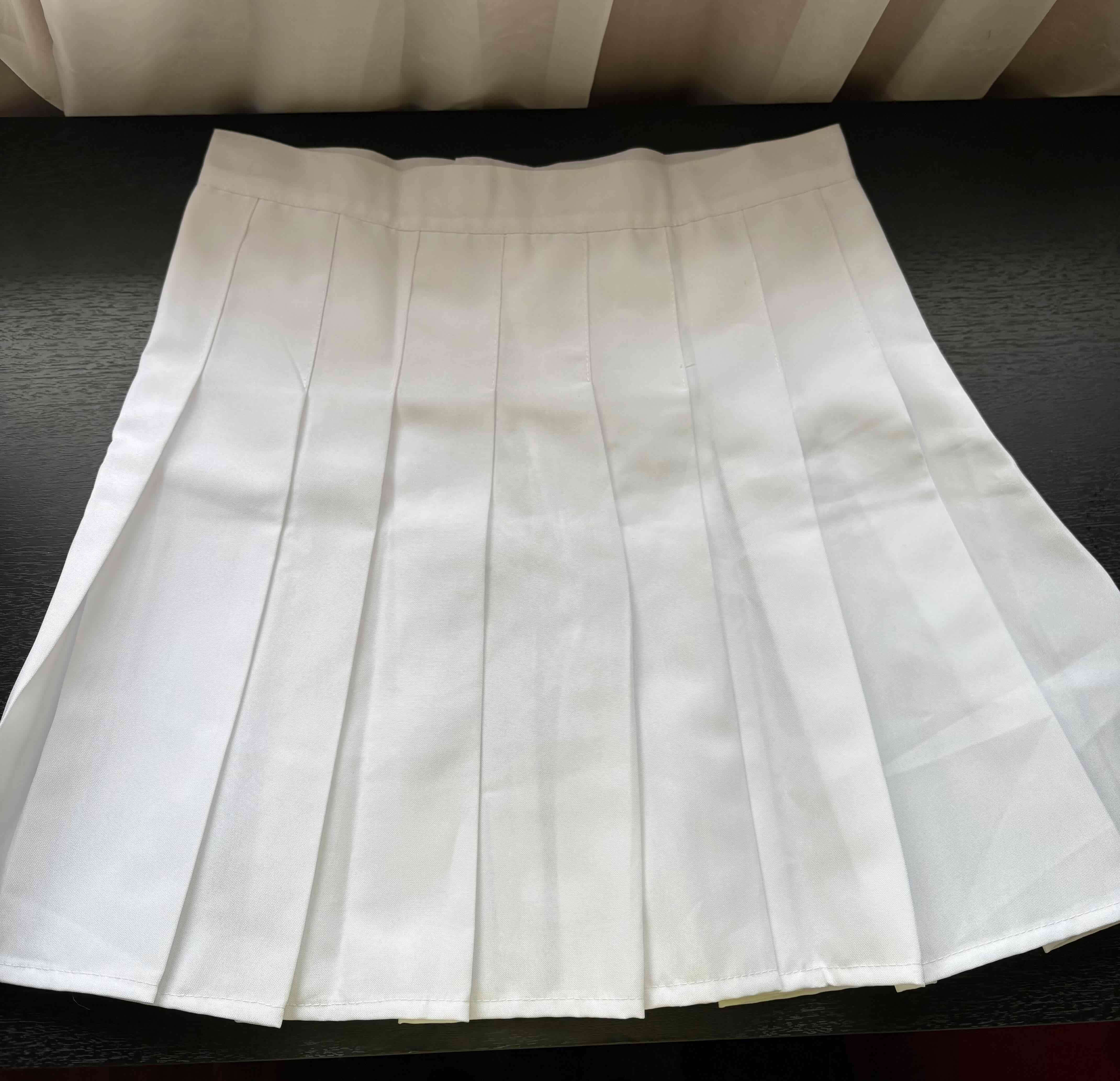 Falda plisada blanca - miniatura 1