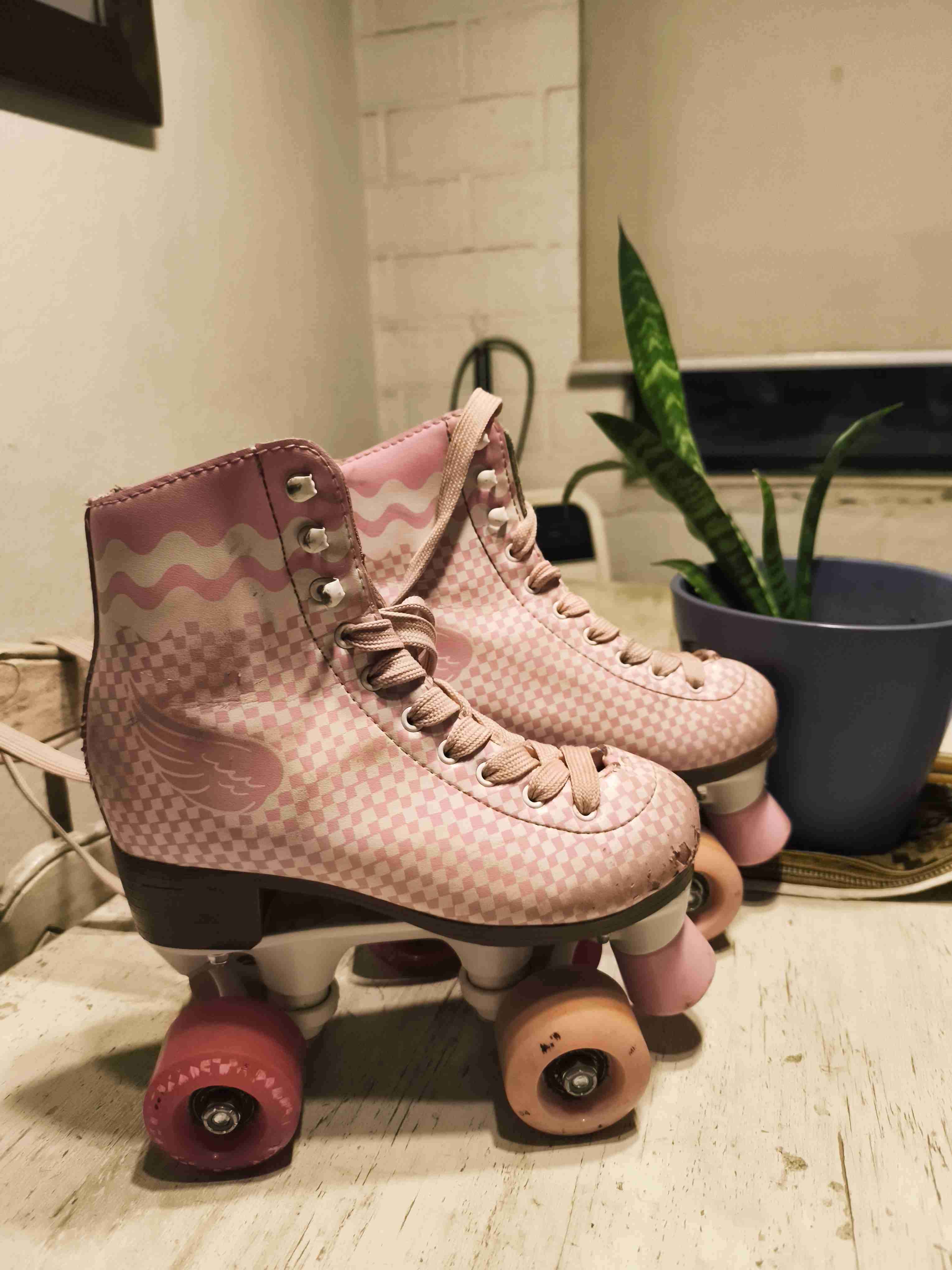 Patines de cuatro ruedas rosados