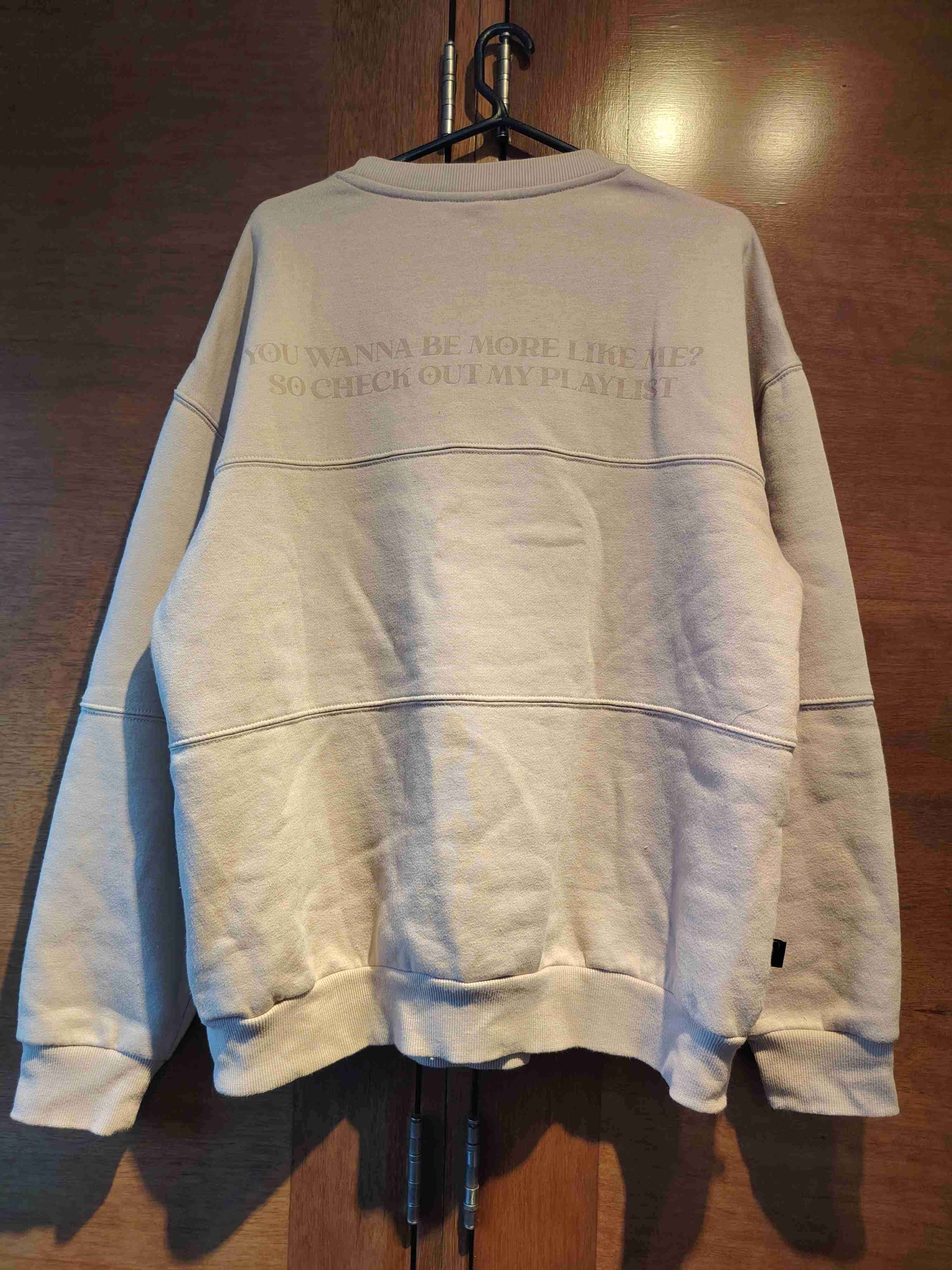 Polerón beige con diseño - miniatura 2