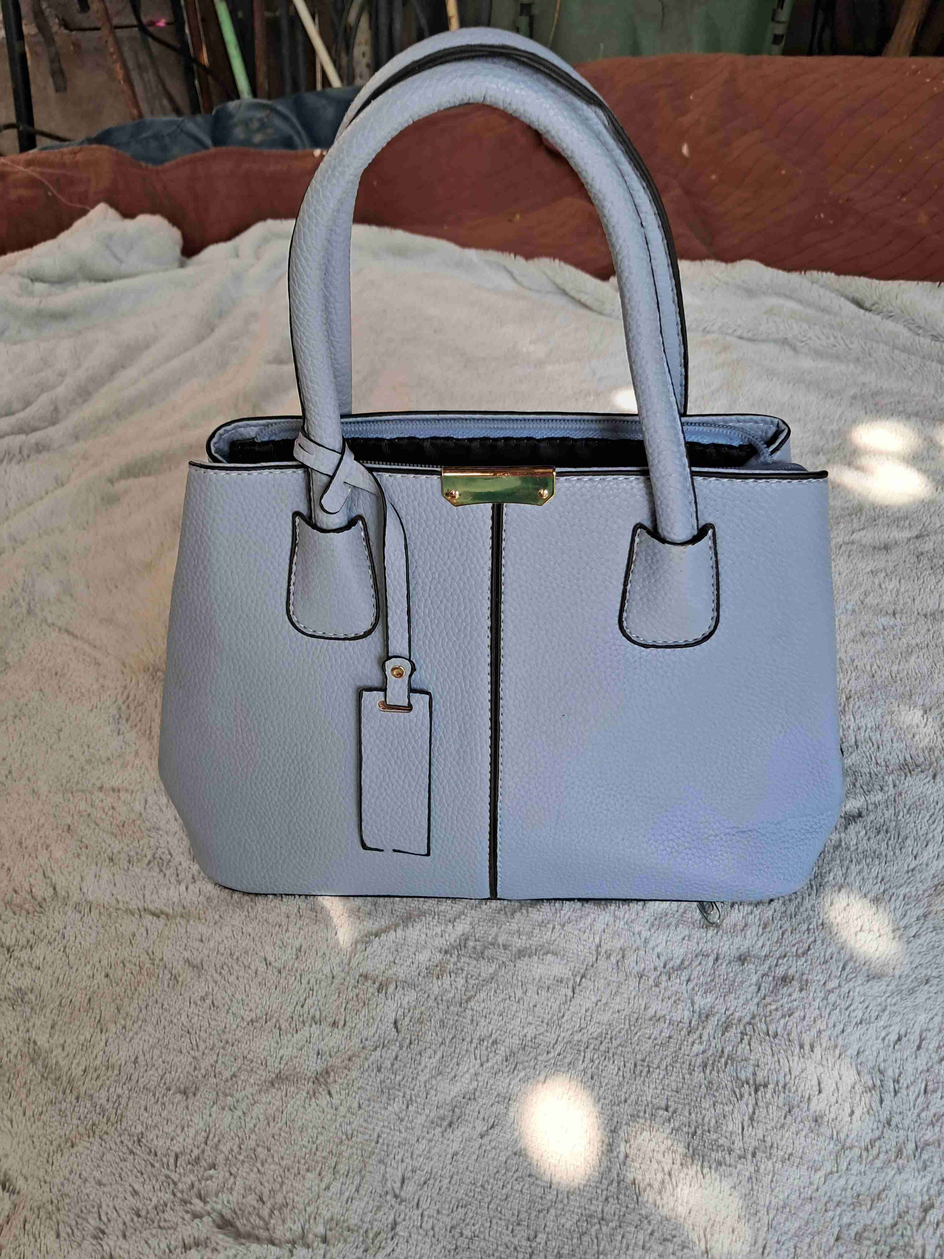 Cartera de mano azul claro - miniatura 1