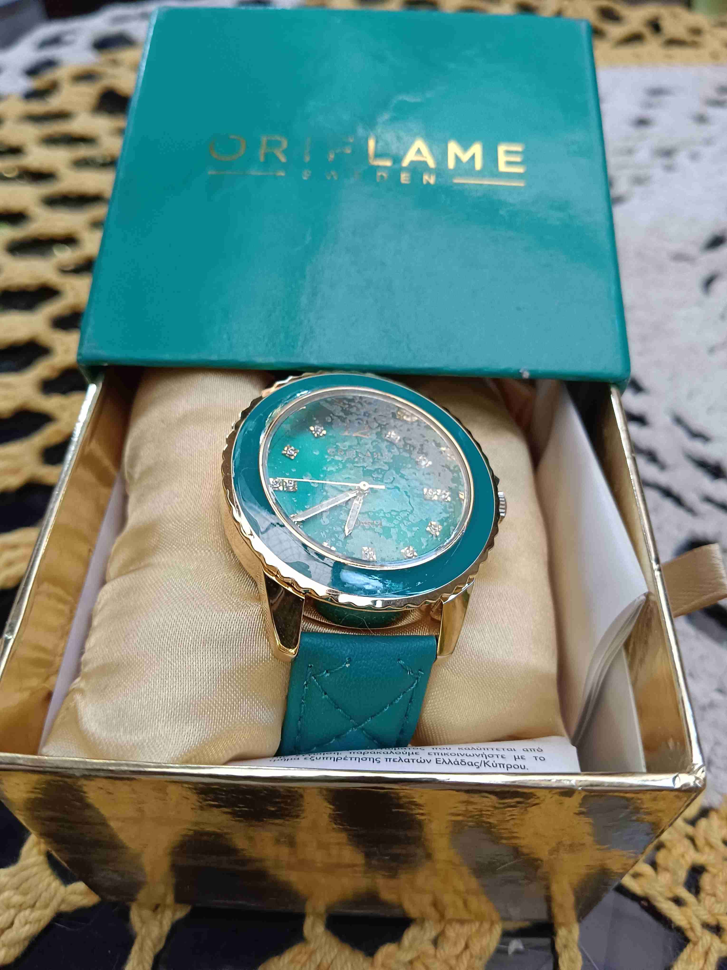 Reloj dorado Oriflame - miniatura 1